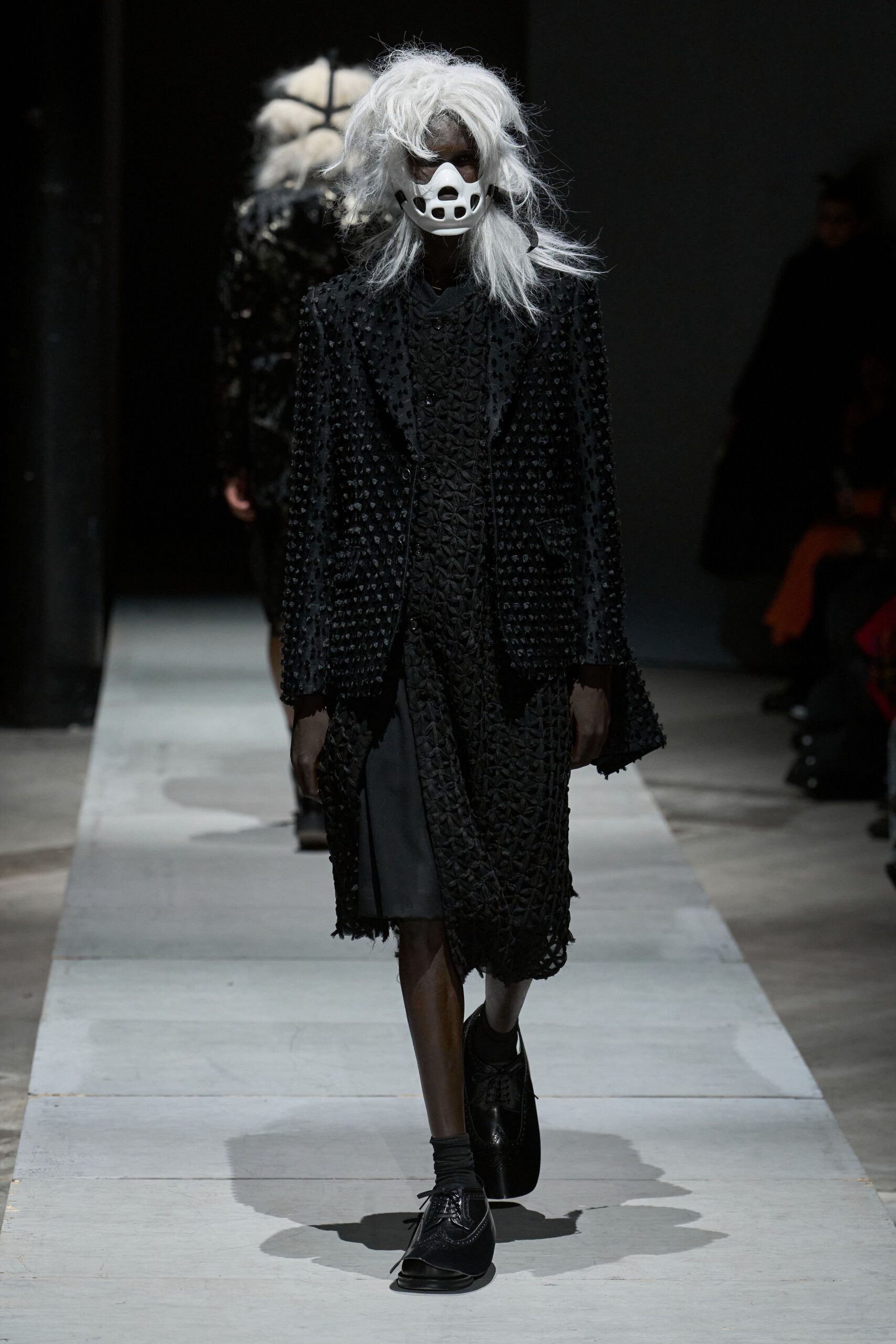 black cotton long-sleeve collared relaxed layered textured coat