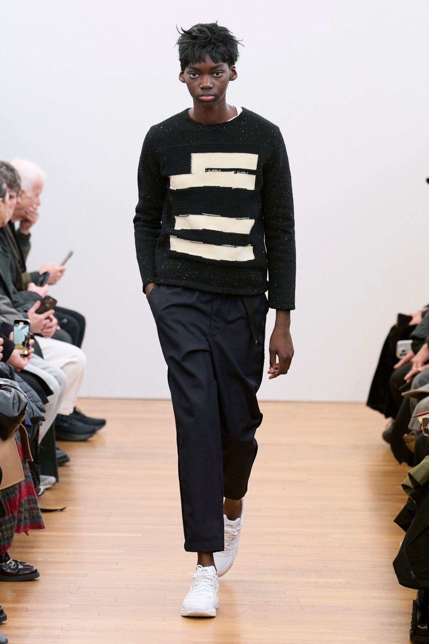 black and white striped sweater with relaxed pants