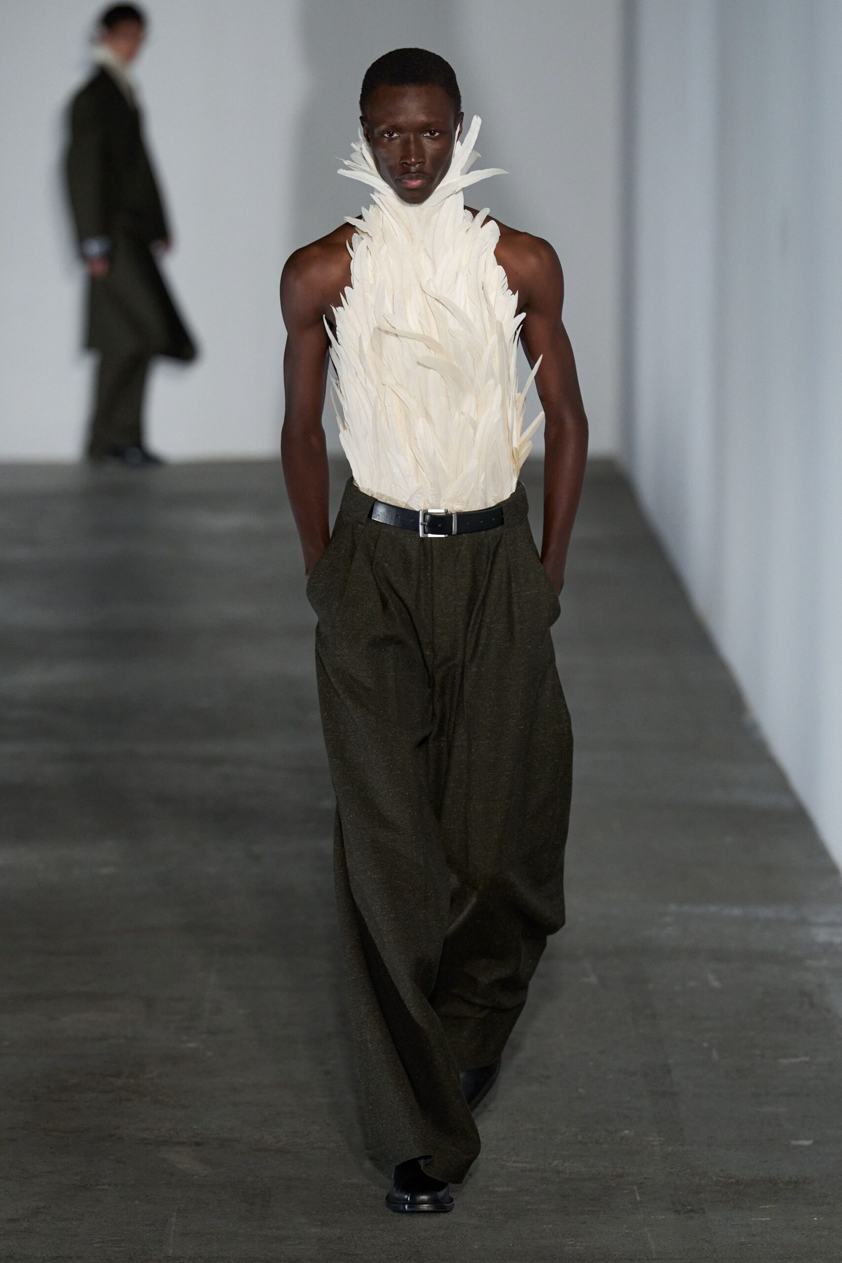 white feather sleeveless high-neck fitted ruffled top