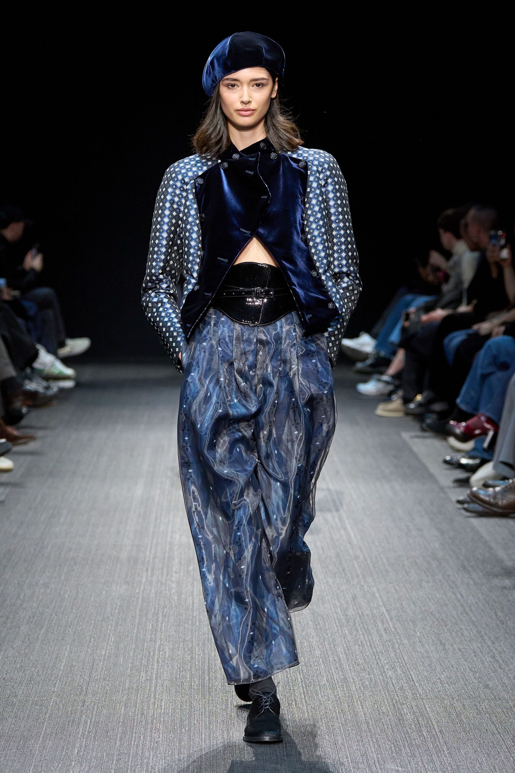 blue polka-dot jacket with black top