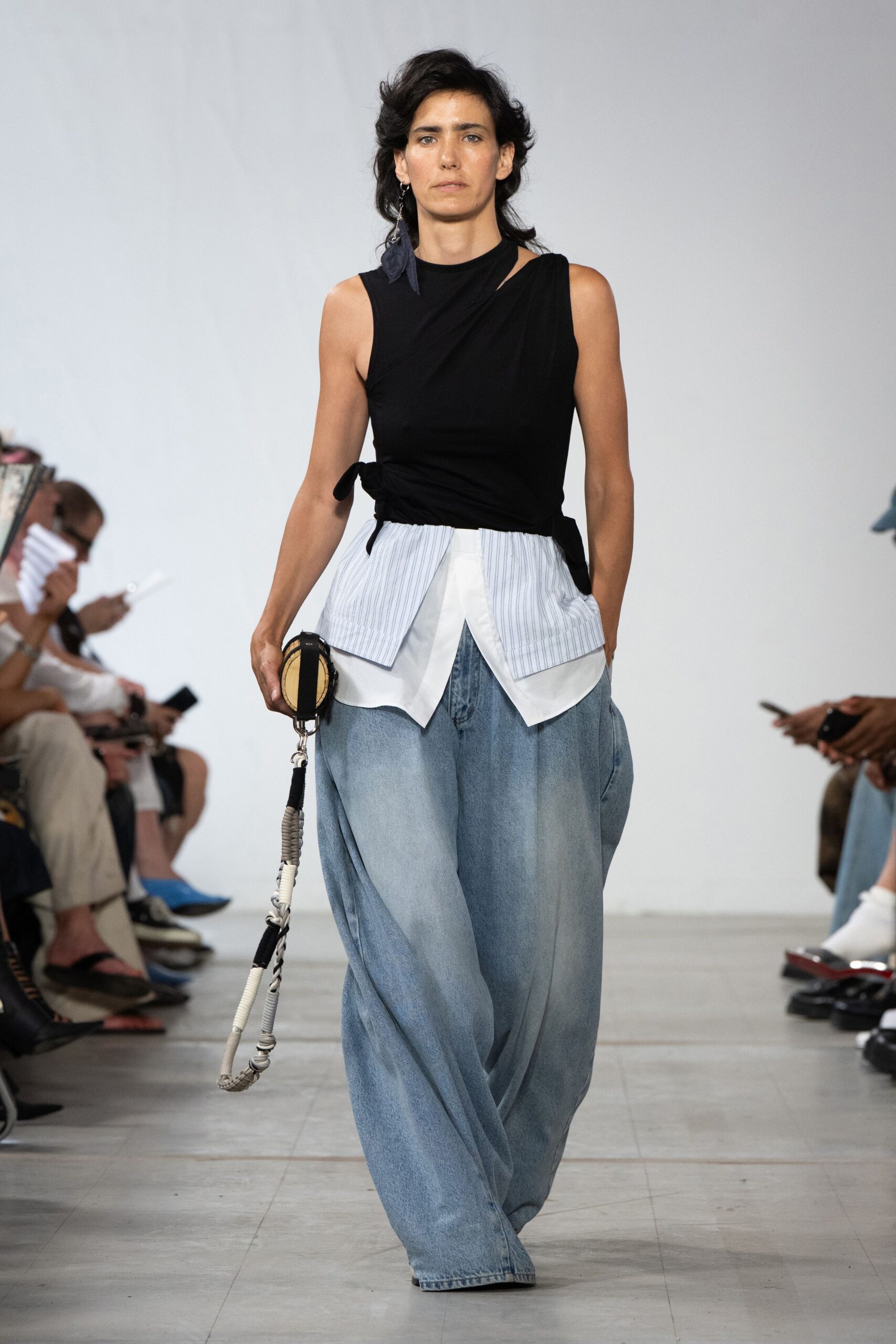 black top white shirt blue pants