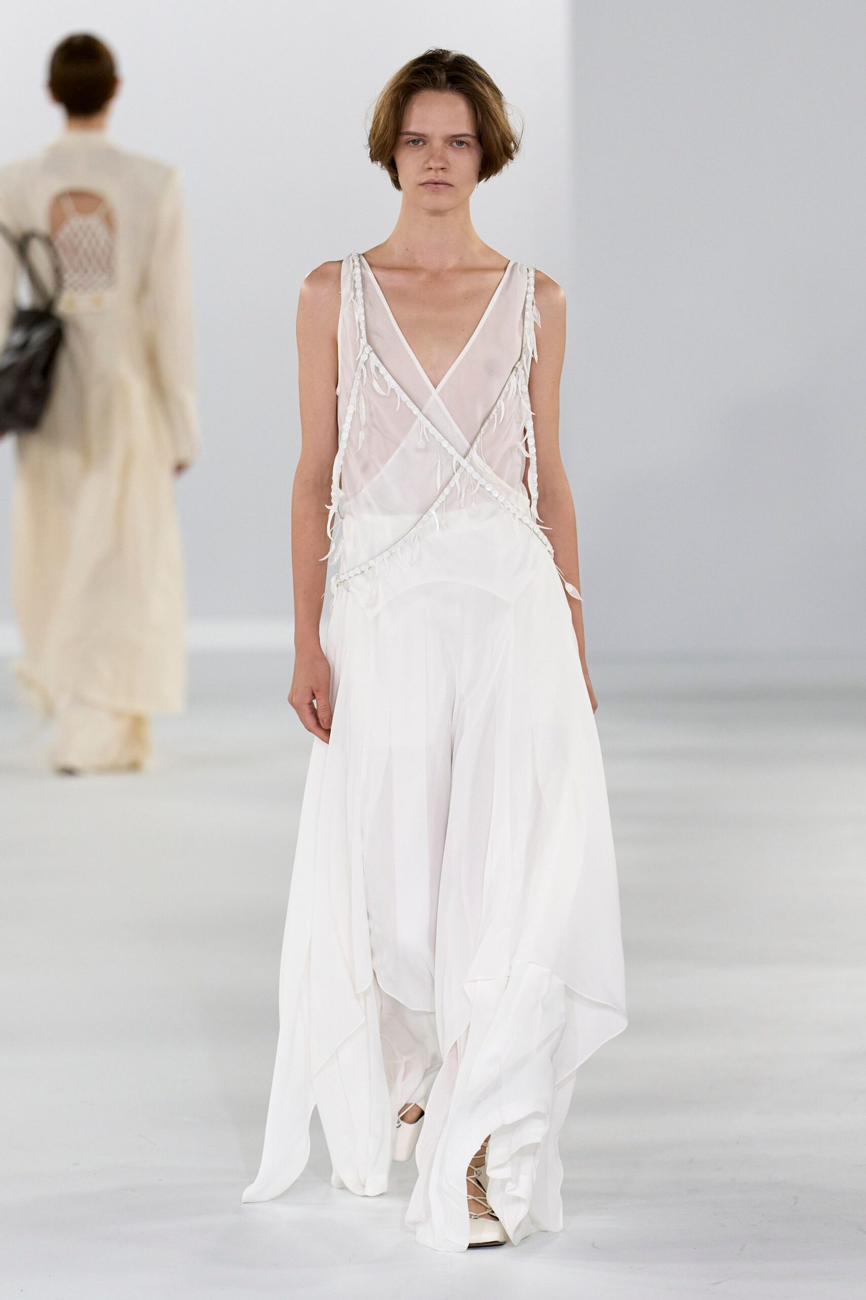 white silk sleeveless dress