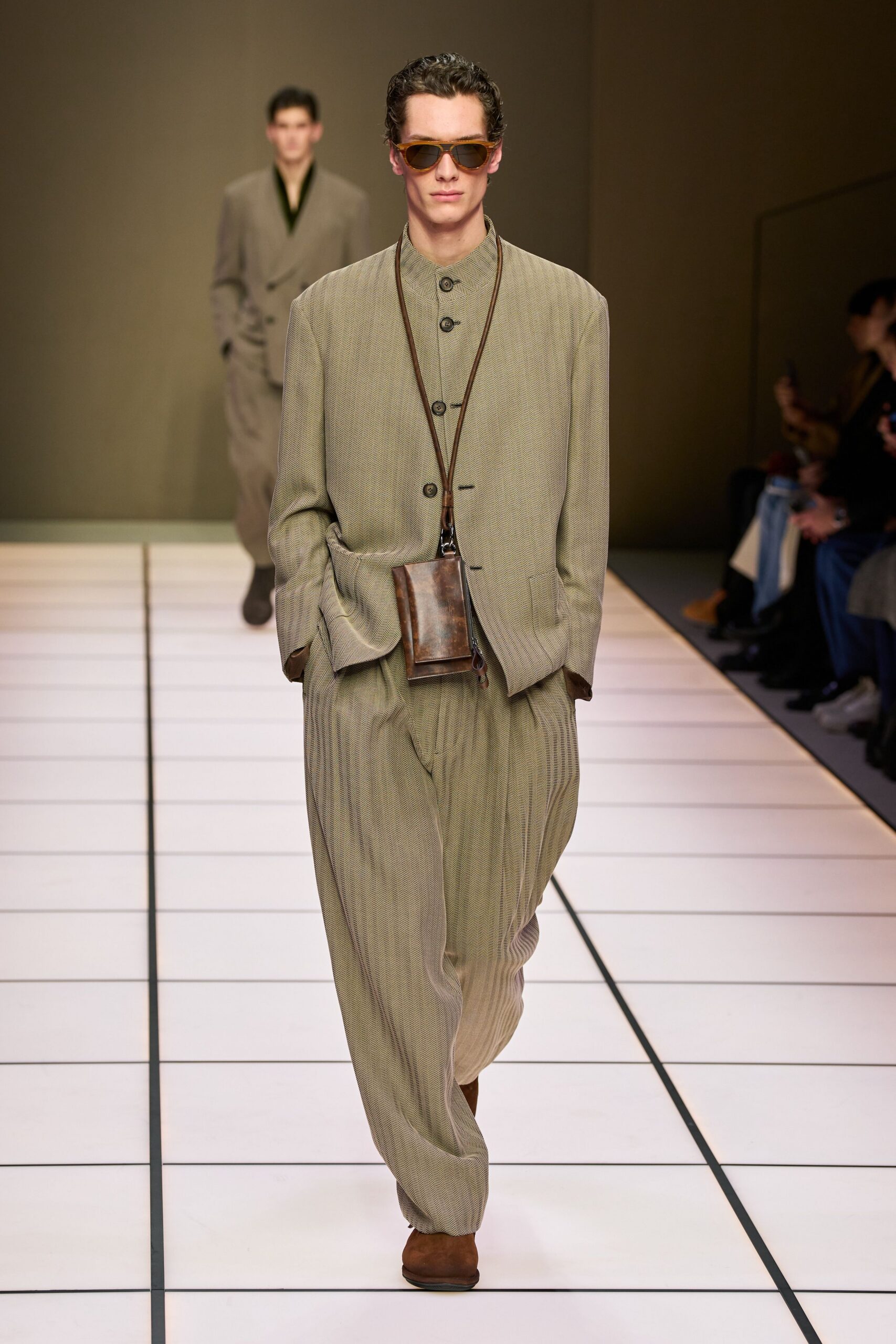 beige relaxed suit with sunglasses