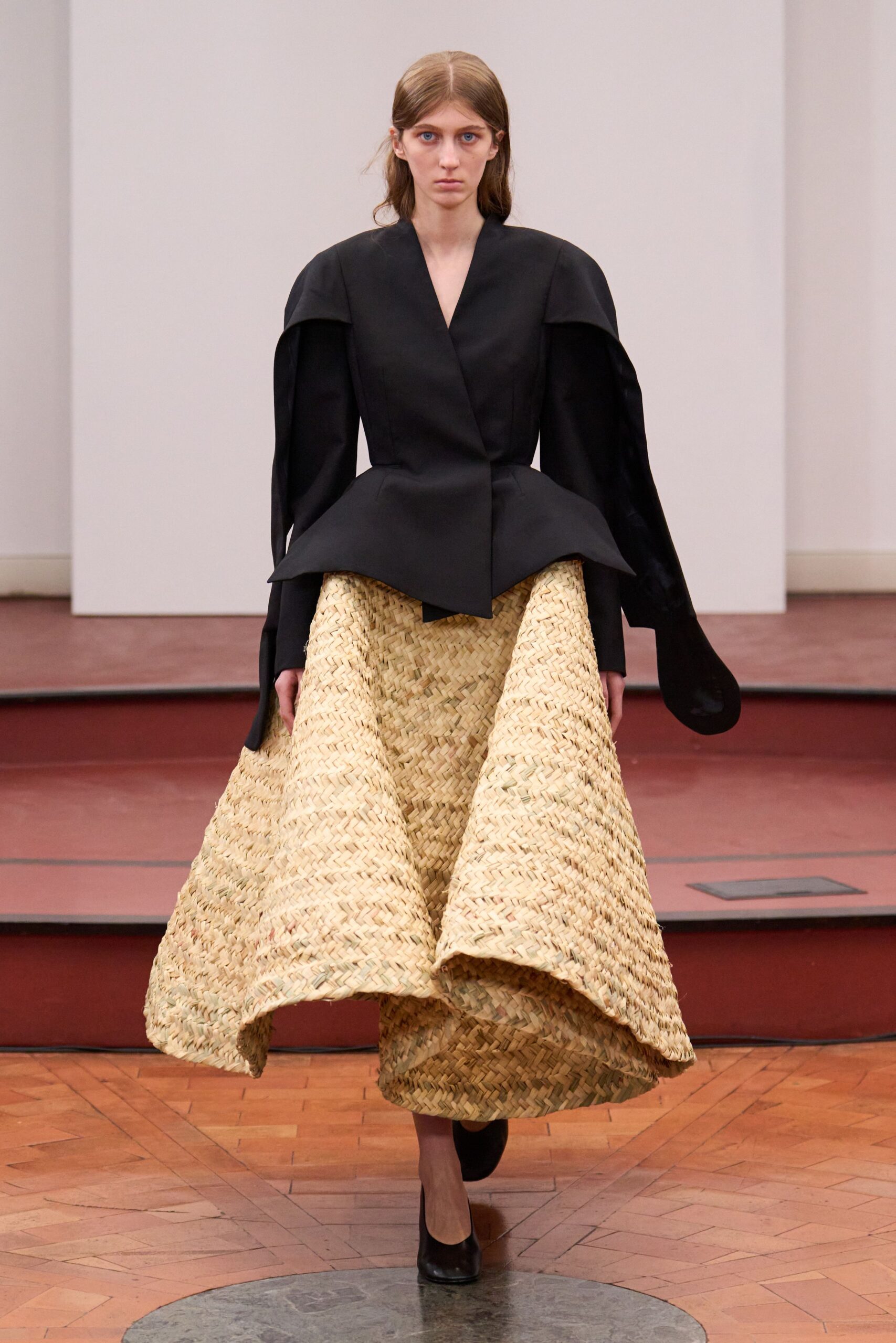 black blazer beige flared skirt