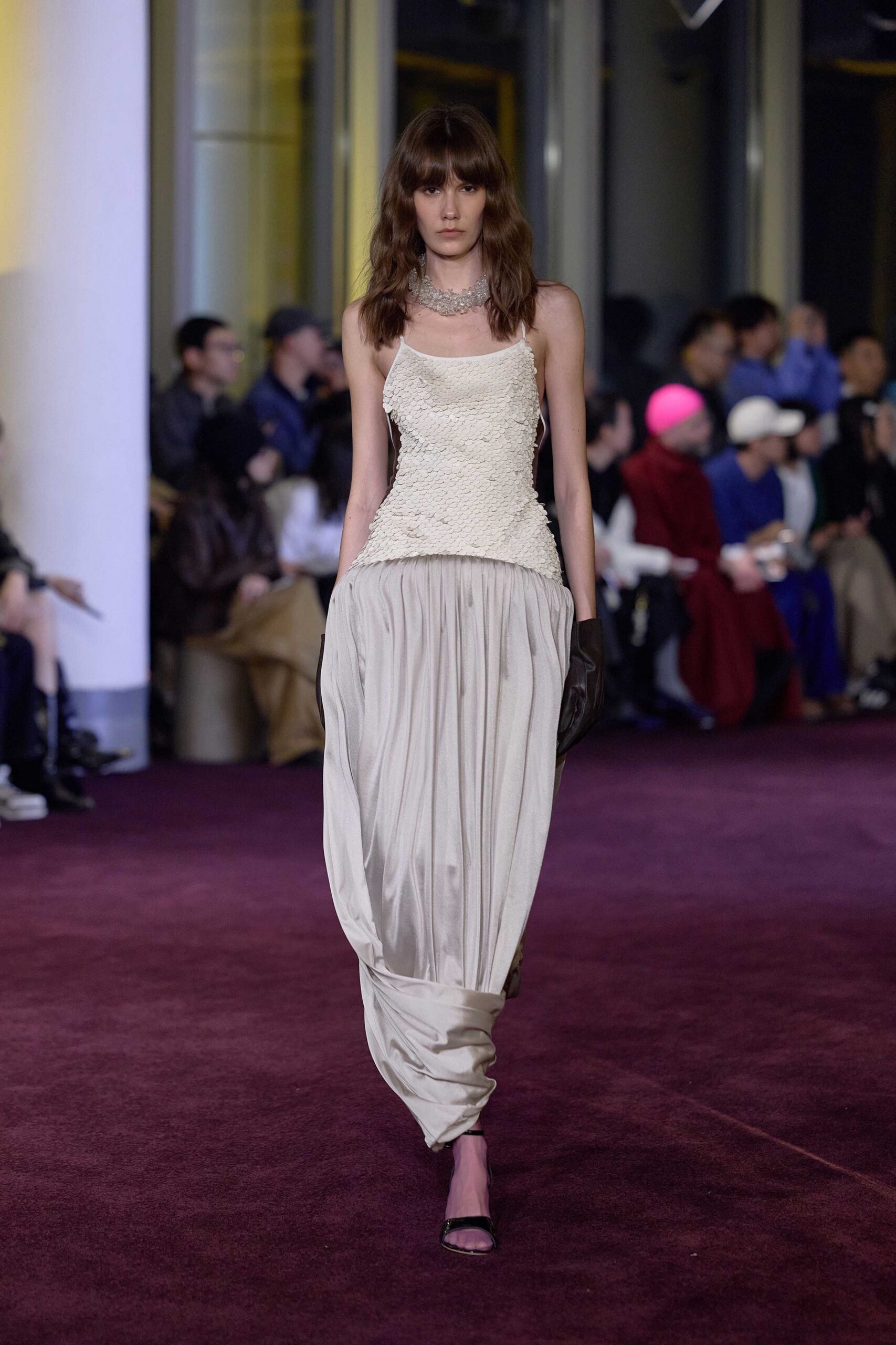 white embroidered top beige draped pants