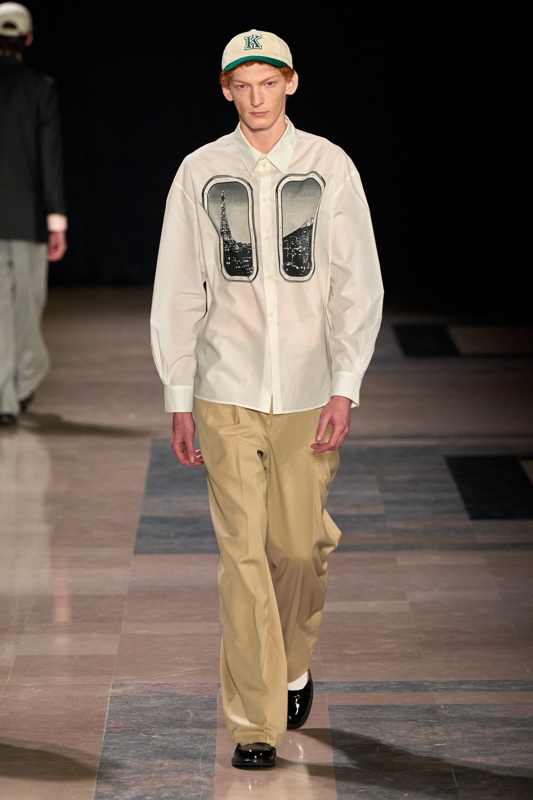 white shirt beige pants black shoes