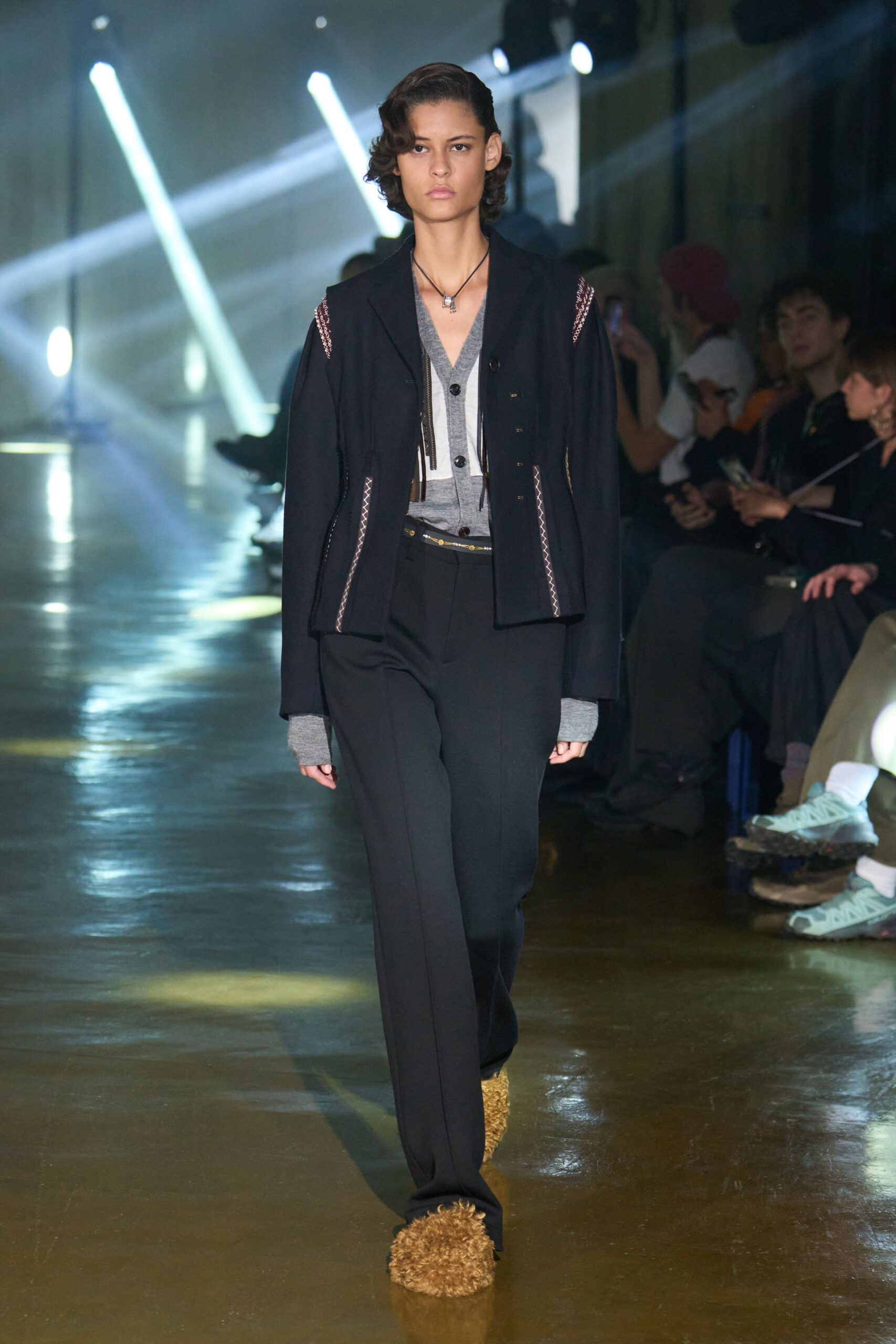 black jacket gray shirt tailored pants
