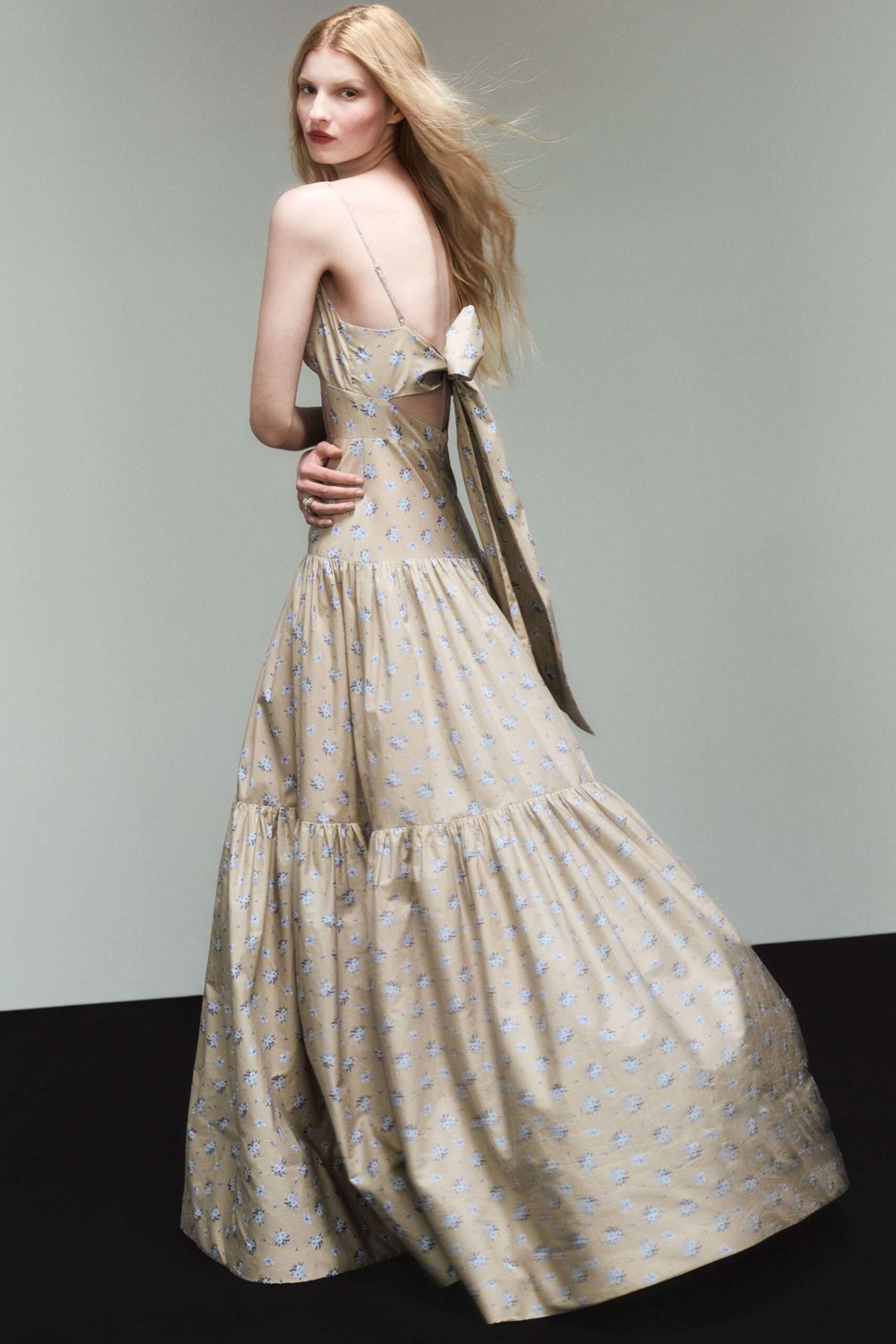 beige floral sleeveless gown