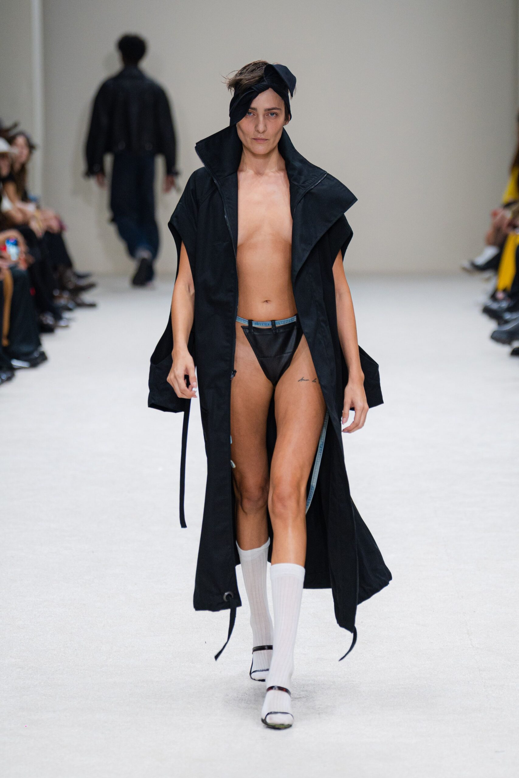 black coat and bikini ensemble