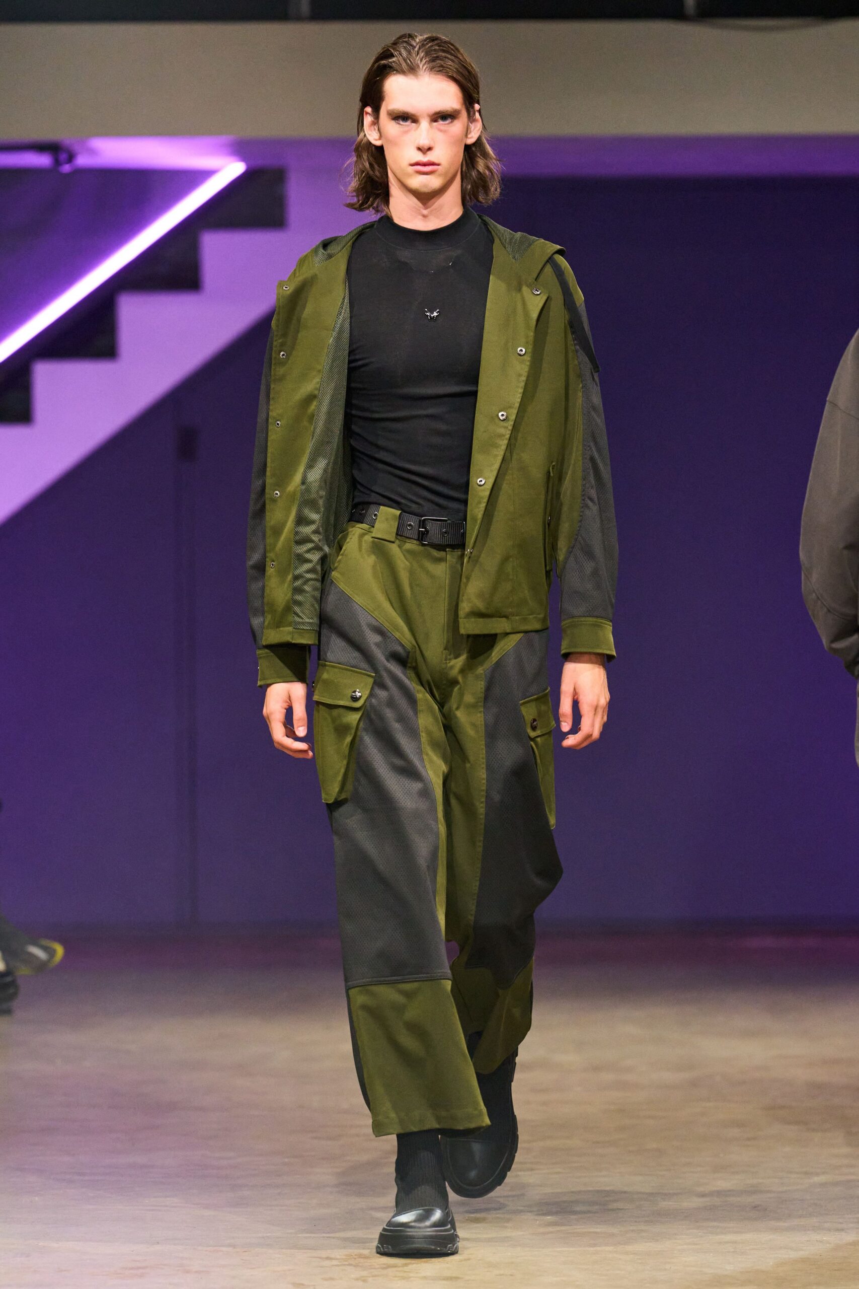 green relaxed jacket with black fitted top