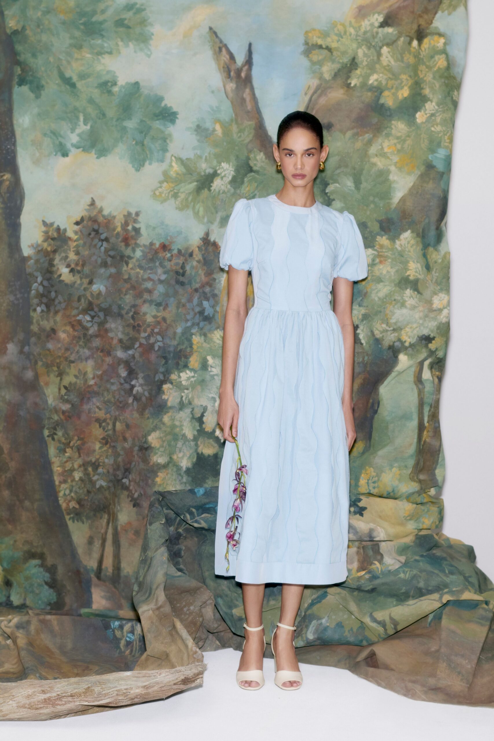 blue pleated midi dress with beige shoes