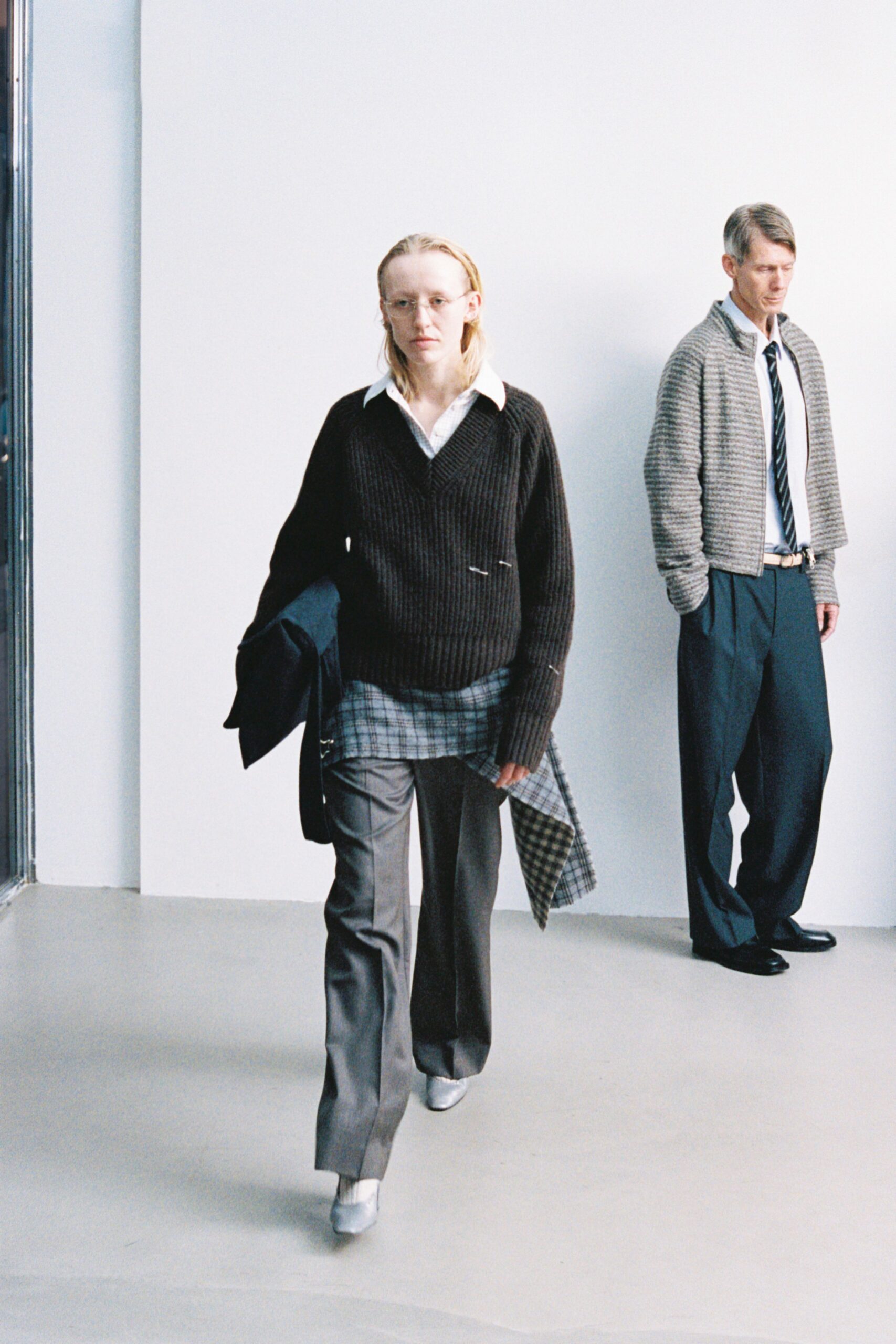 brown wool sweater with gray pants