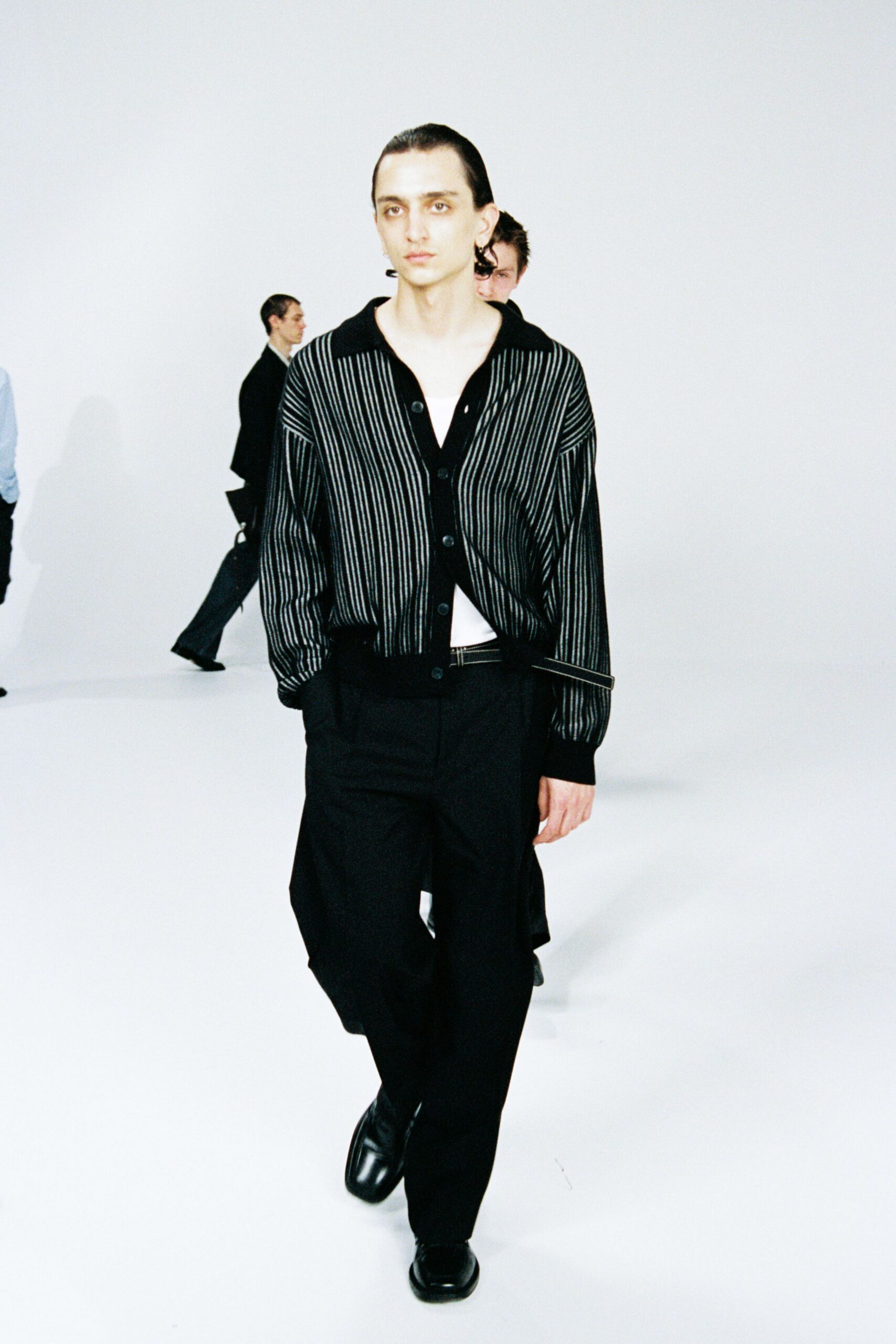 black and white striped shirt with relaxed pants