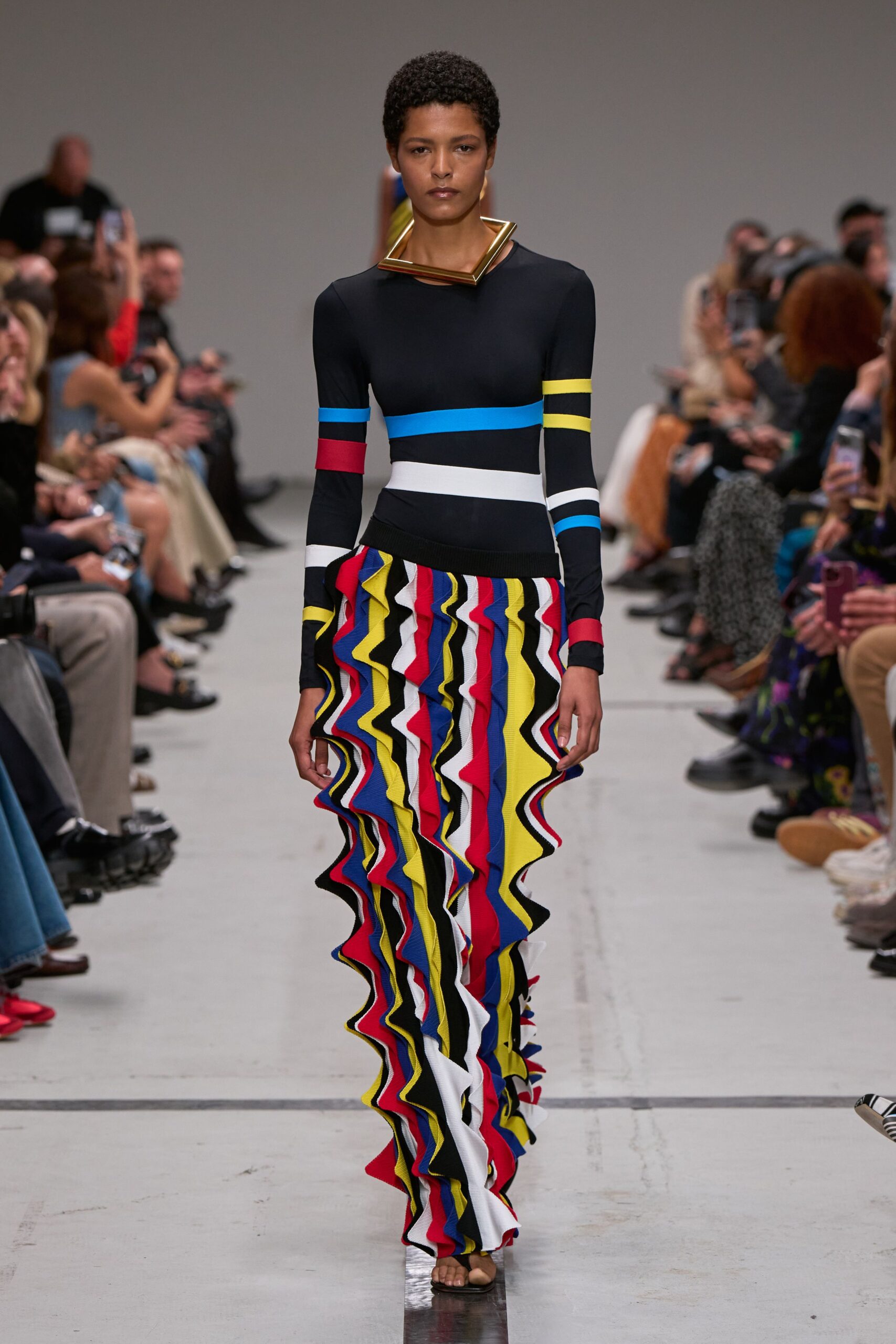 color-blocked fitted top and ruffled skirt