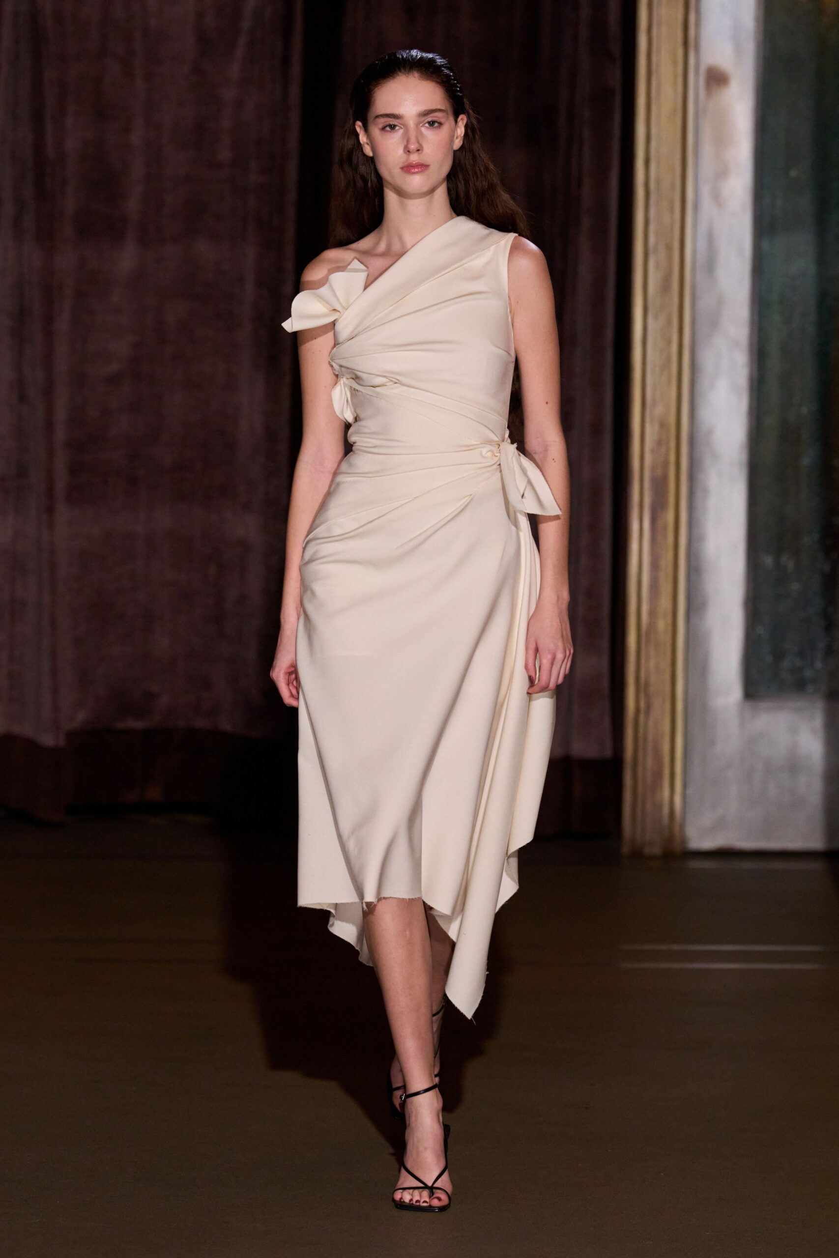 beige silk sleeveless asymmetric fitted draped belted dress