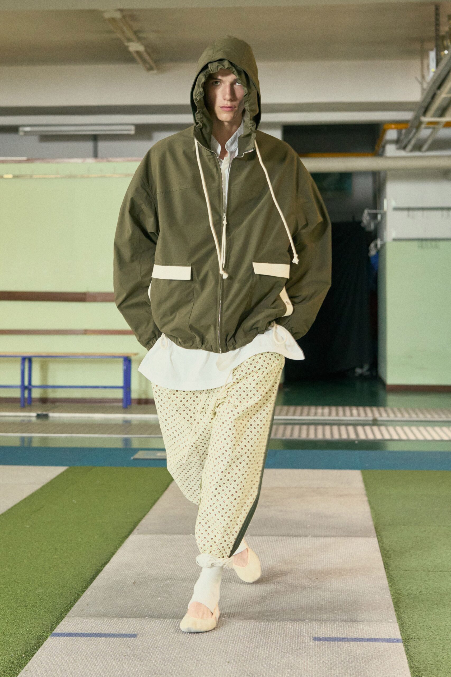 oversized green jacket with polka-dot pants