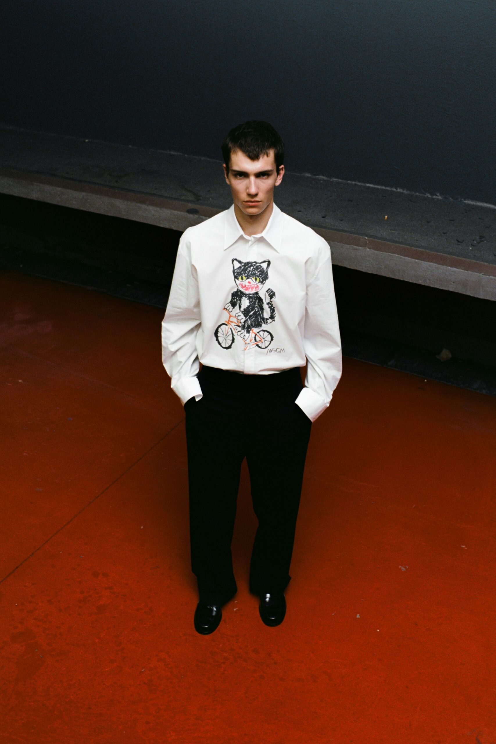 white printed shirt black pants