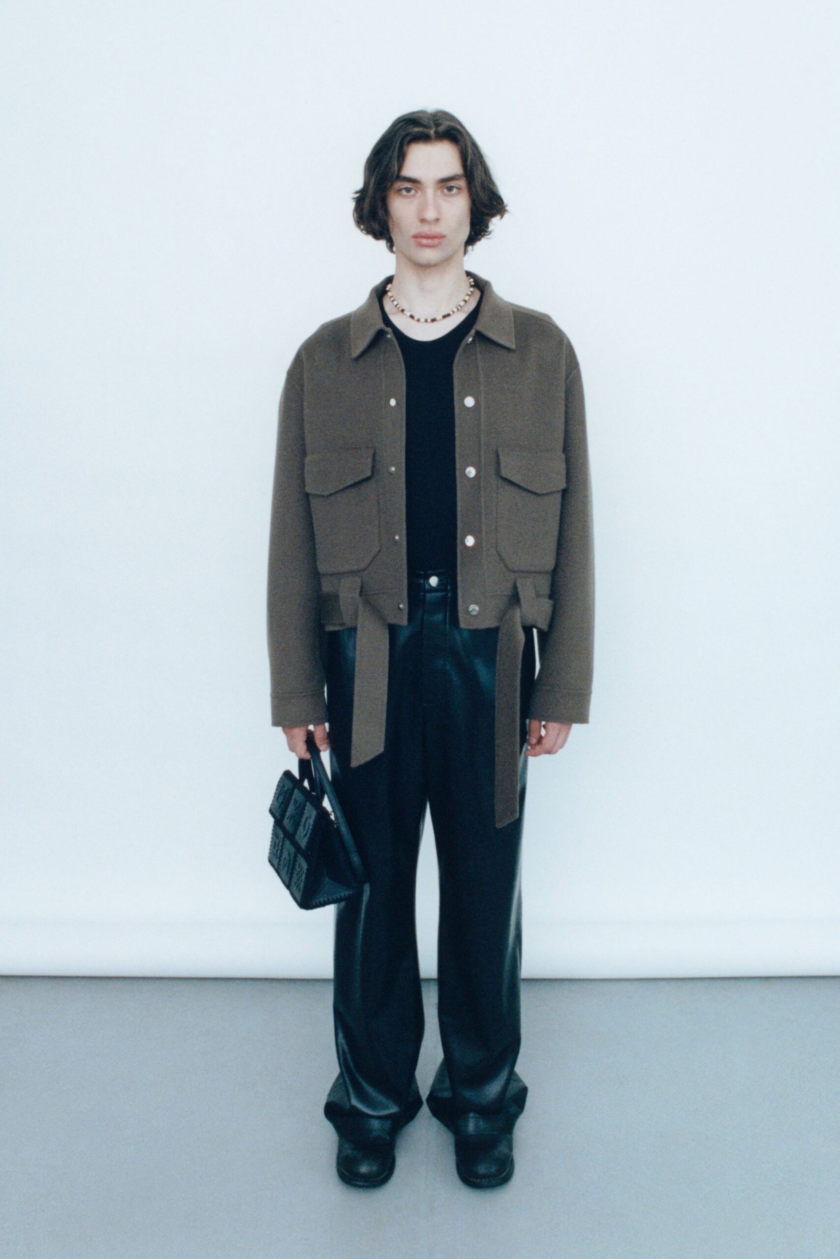brown relaxed jacket with black top