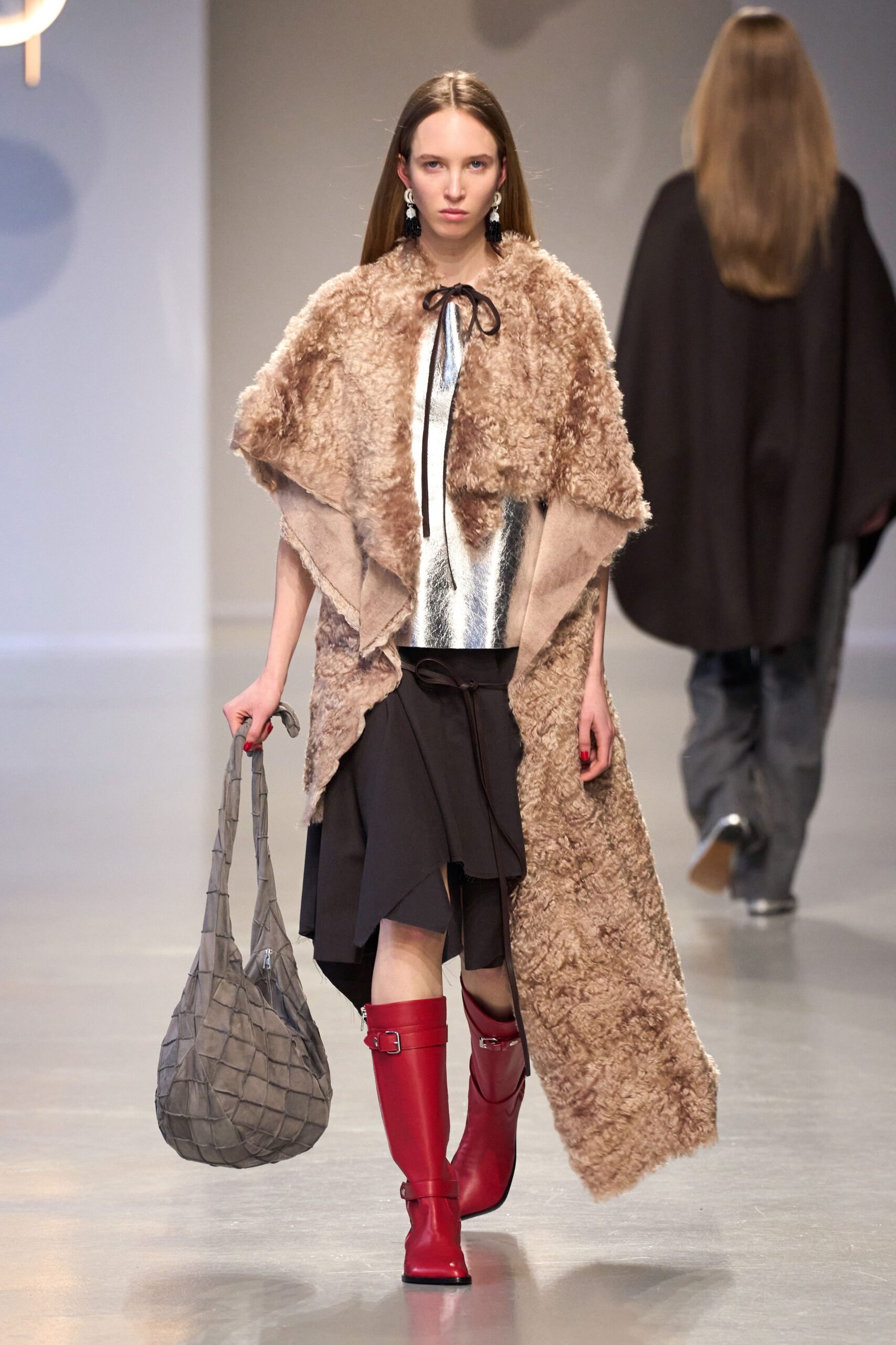 beige fur cape with silver top
