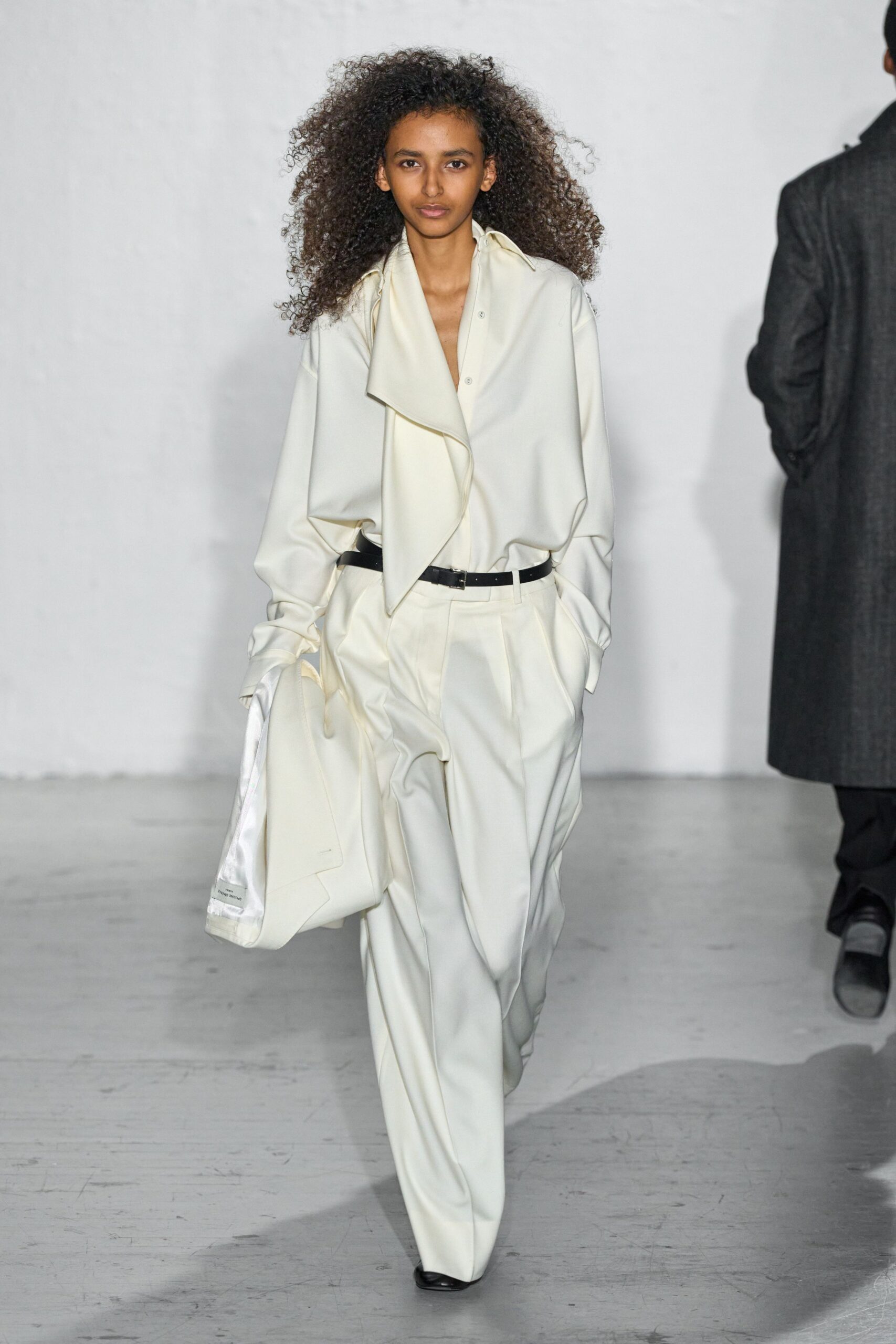 white silk long-sleeve collared relaxed buttoned blouse
