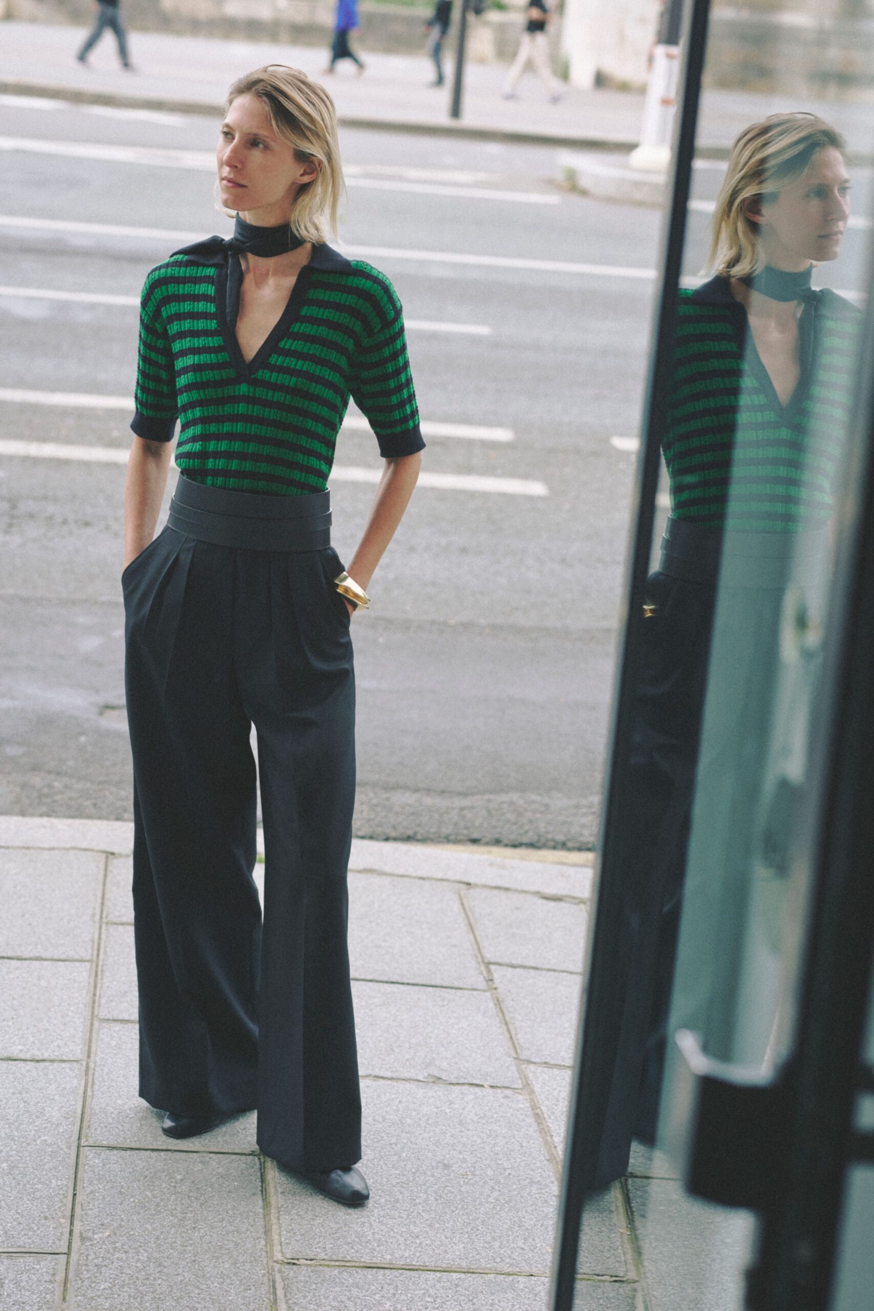 green striped fitted top with tailored pants