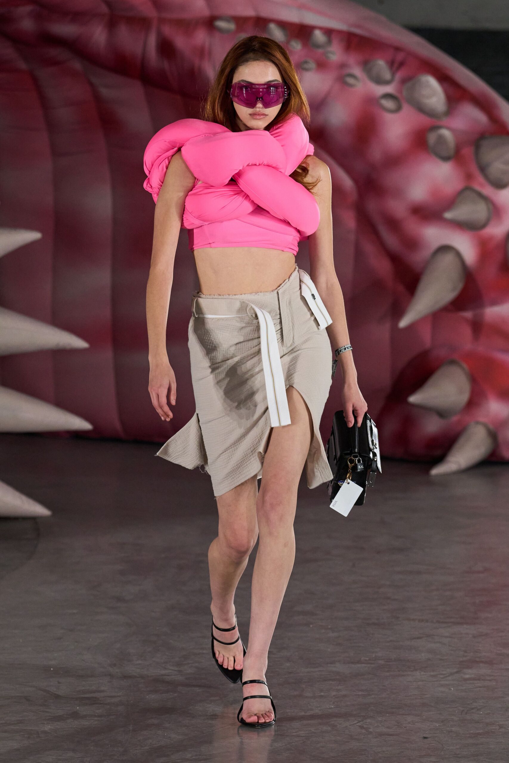 pink padded top beige skirt