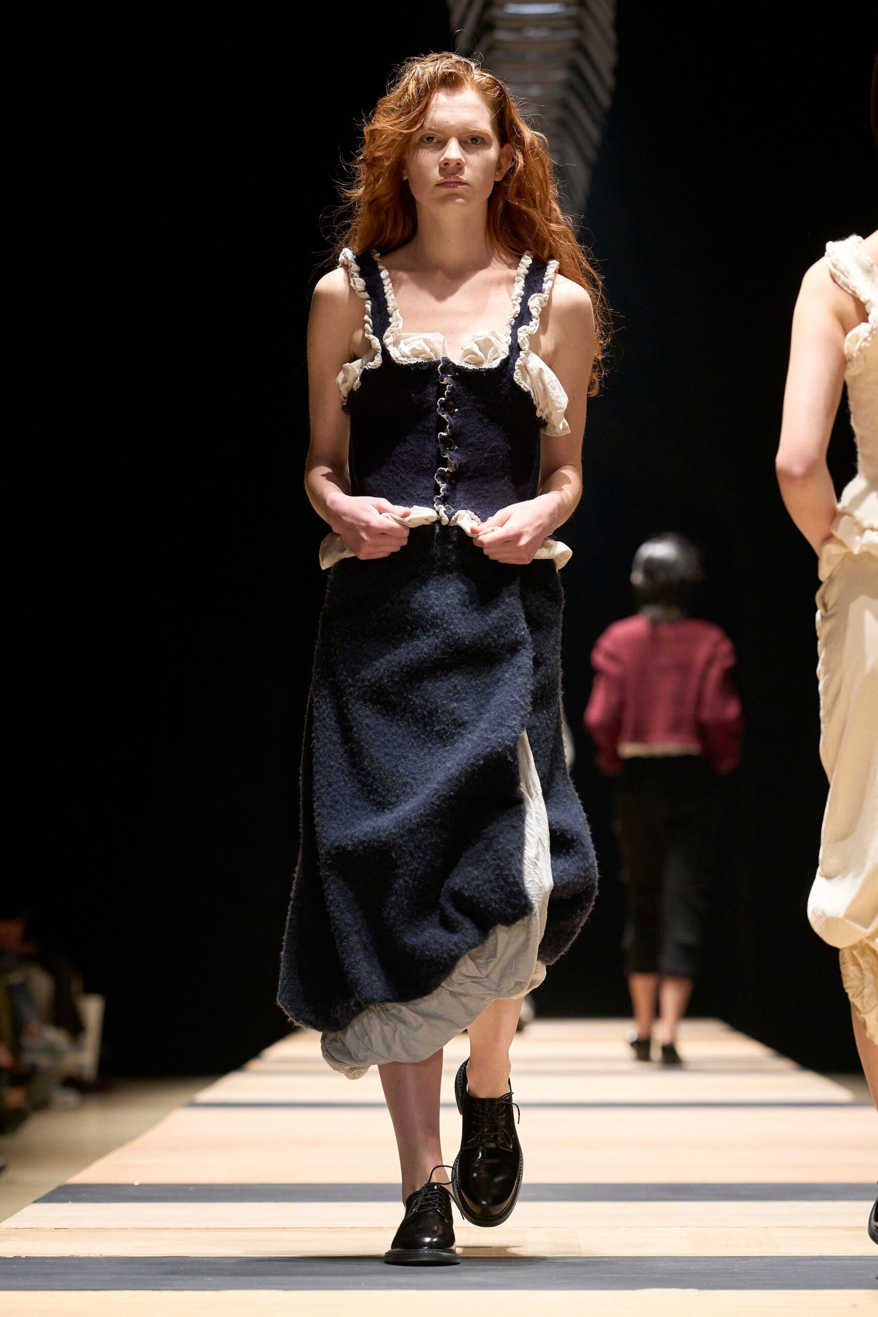 blue wool sleeveless v-neck fitted buttoned ruffled dress