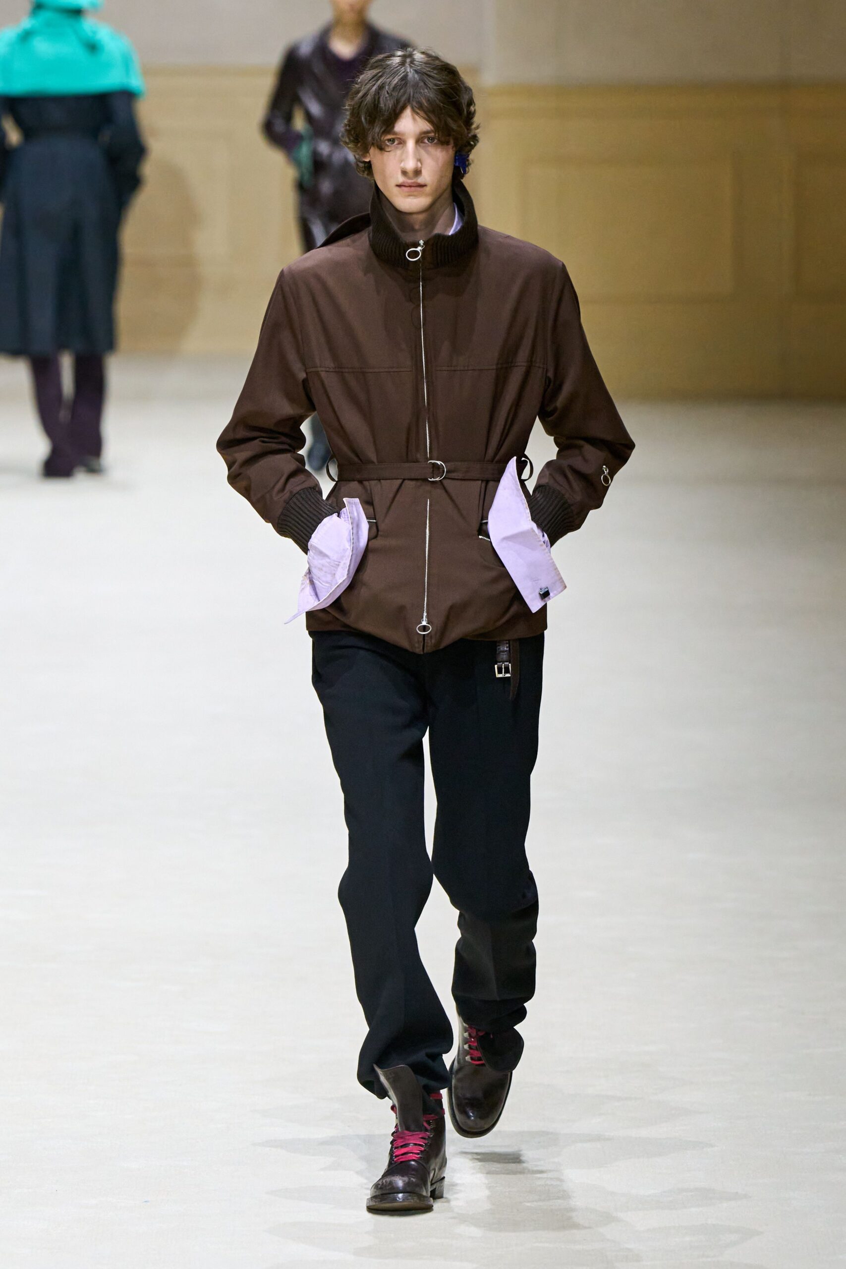 brown fitted jacket with black pants