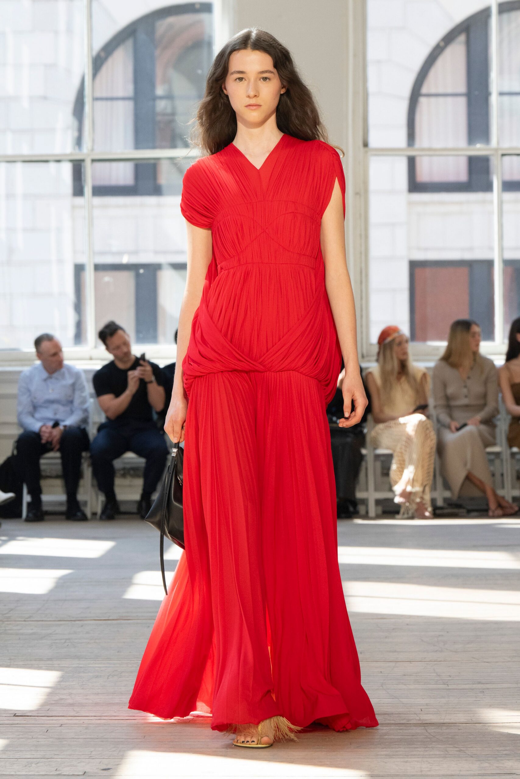 red silk short-sleeve v-neck fitted pleated draped gown
