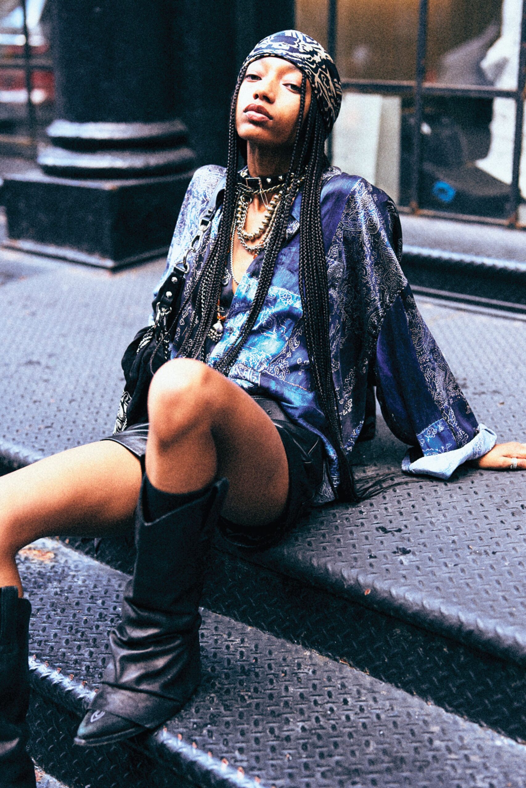 blue silk relaxed top with black leather shorts