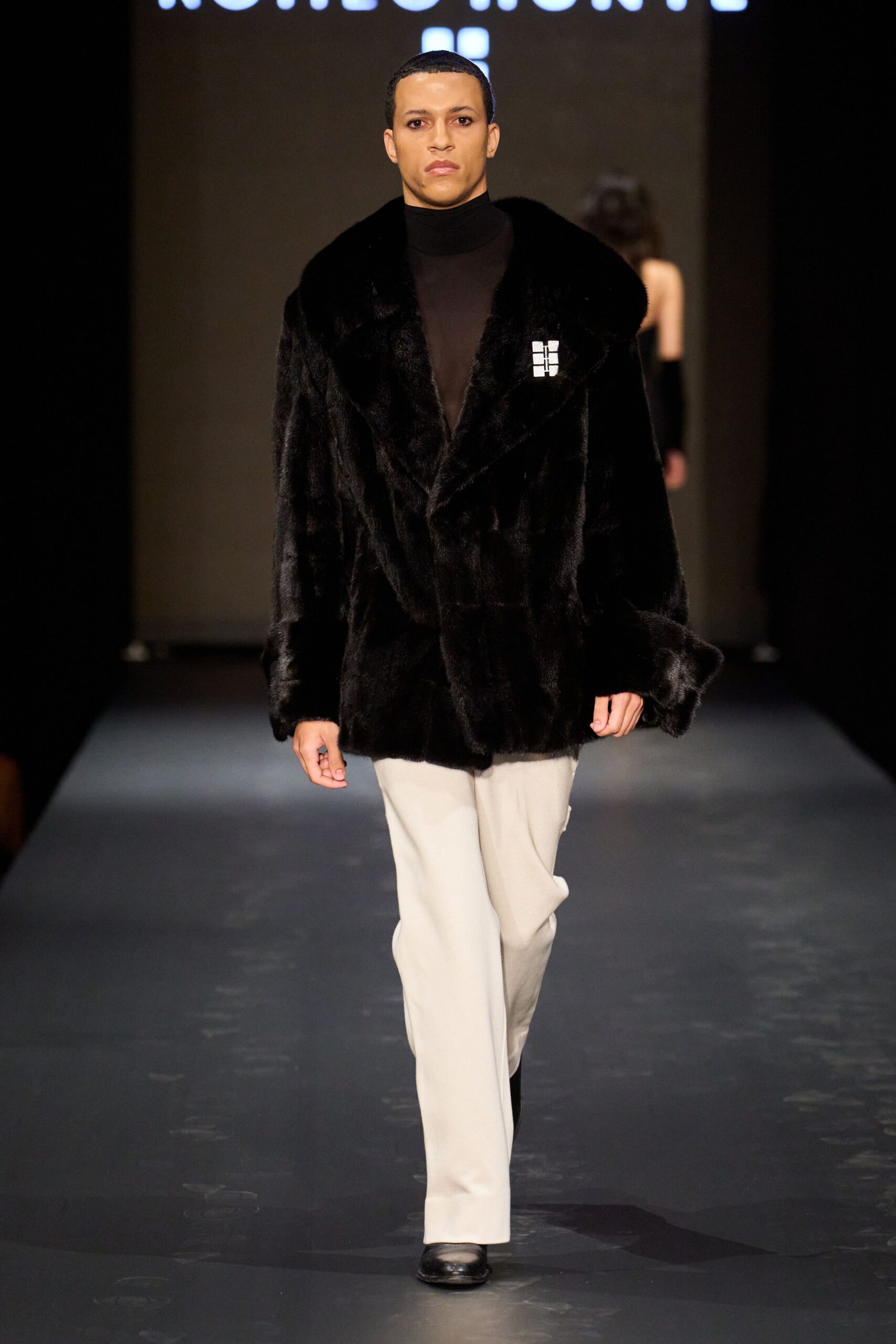 black faux-fur coat with fitted top