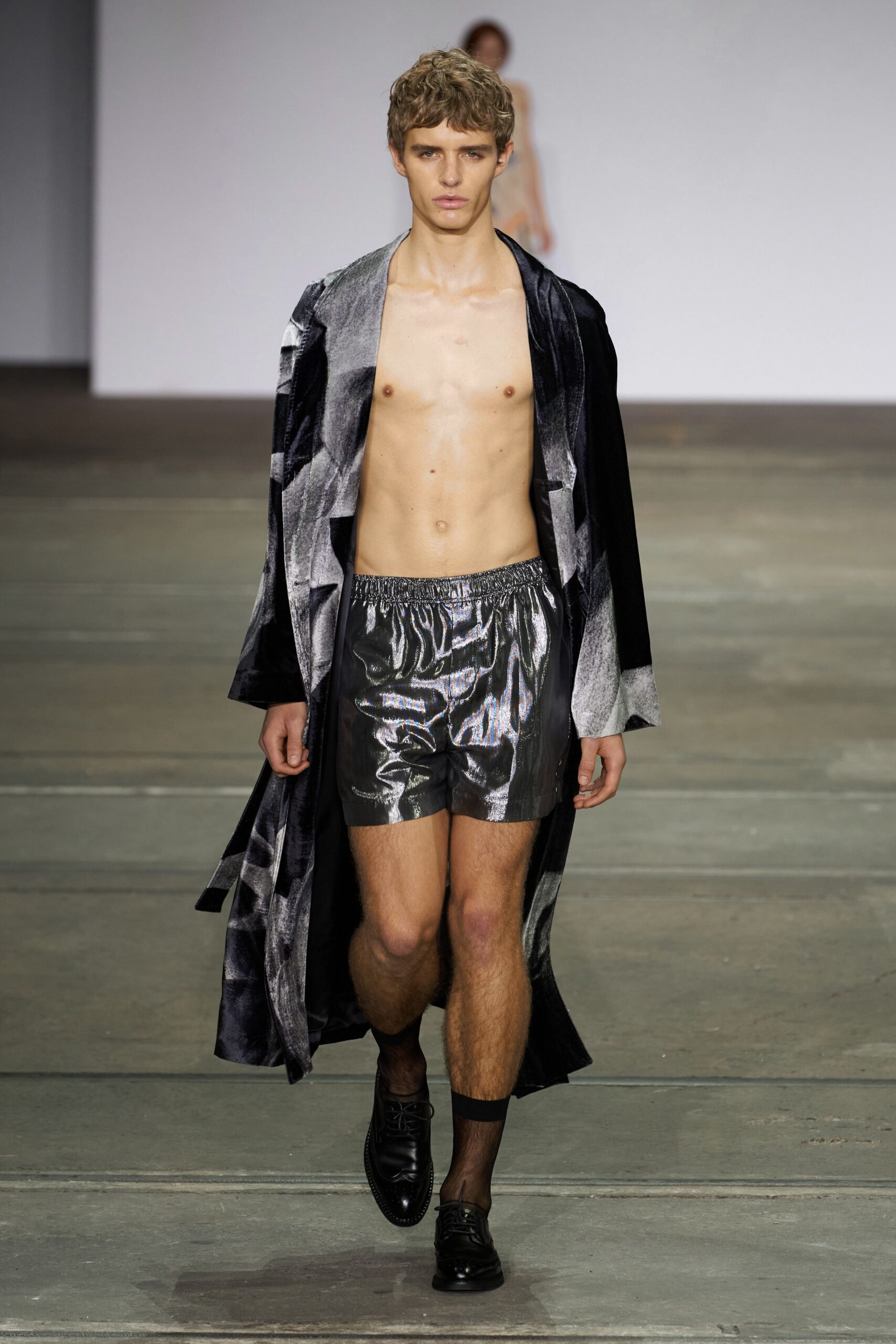 black velvet coat with vinyl shorts