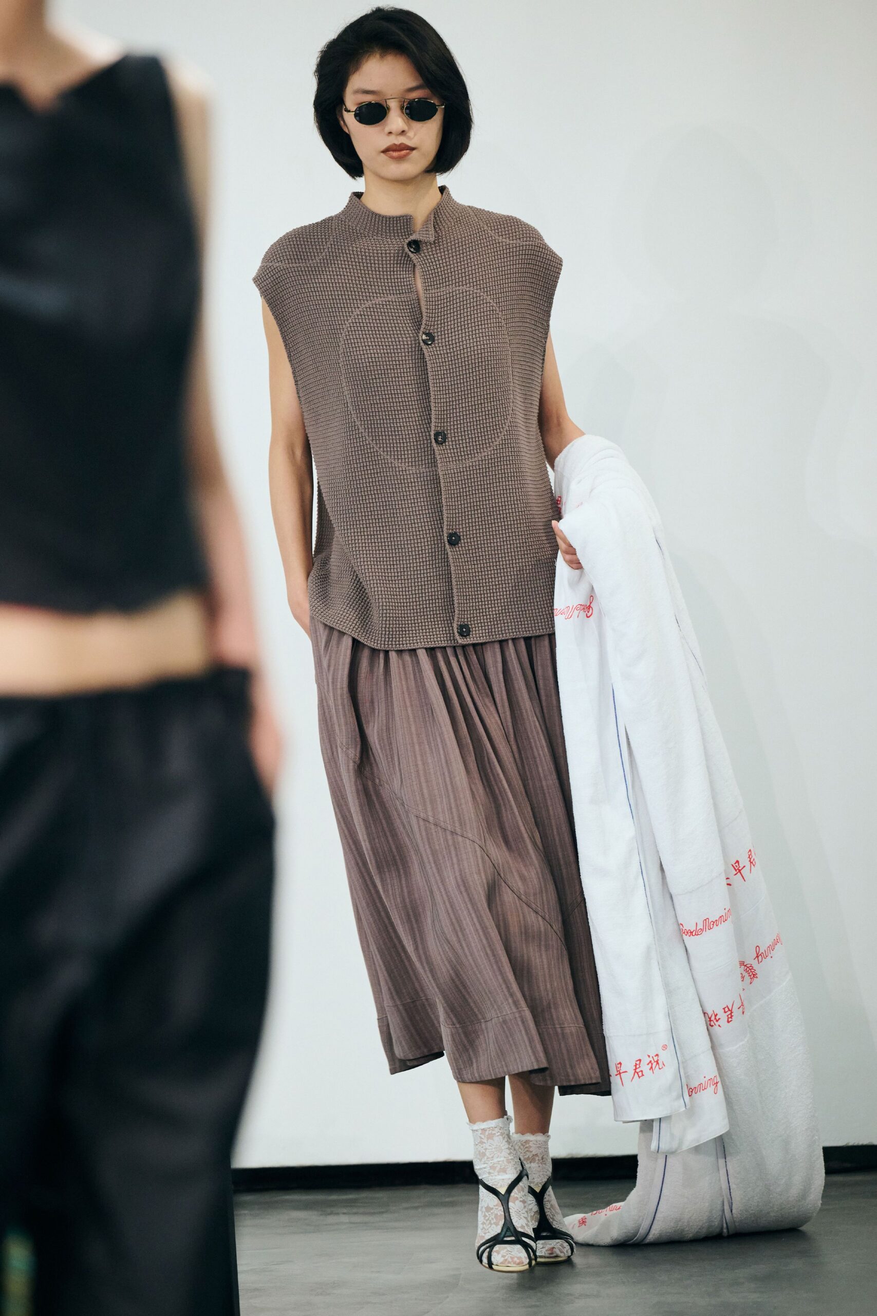 brown pleated top and skirt