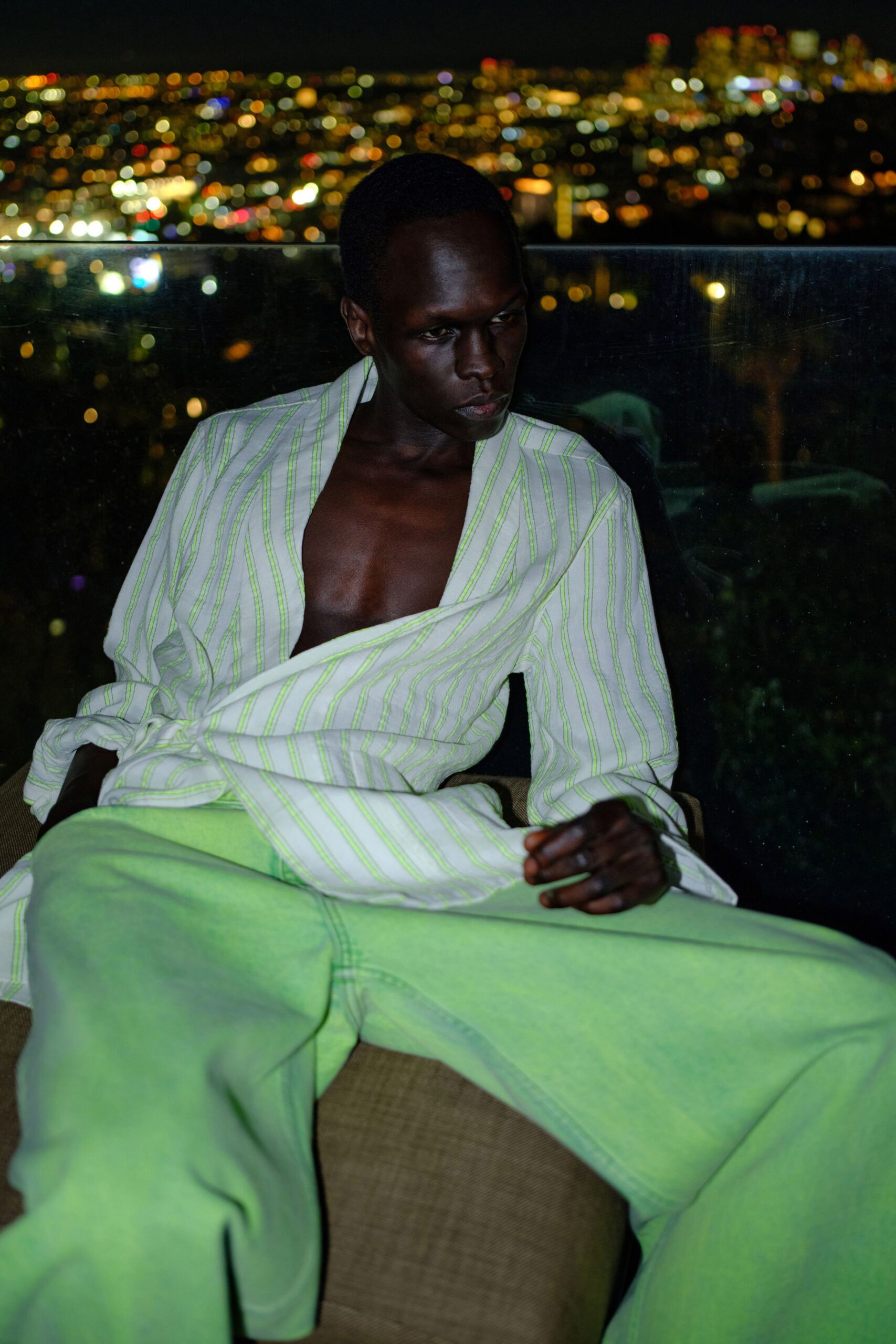 striped white and green shirt with wide-leg pants
