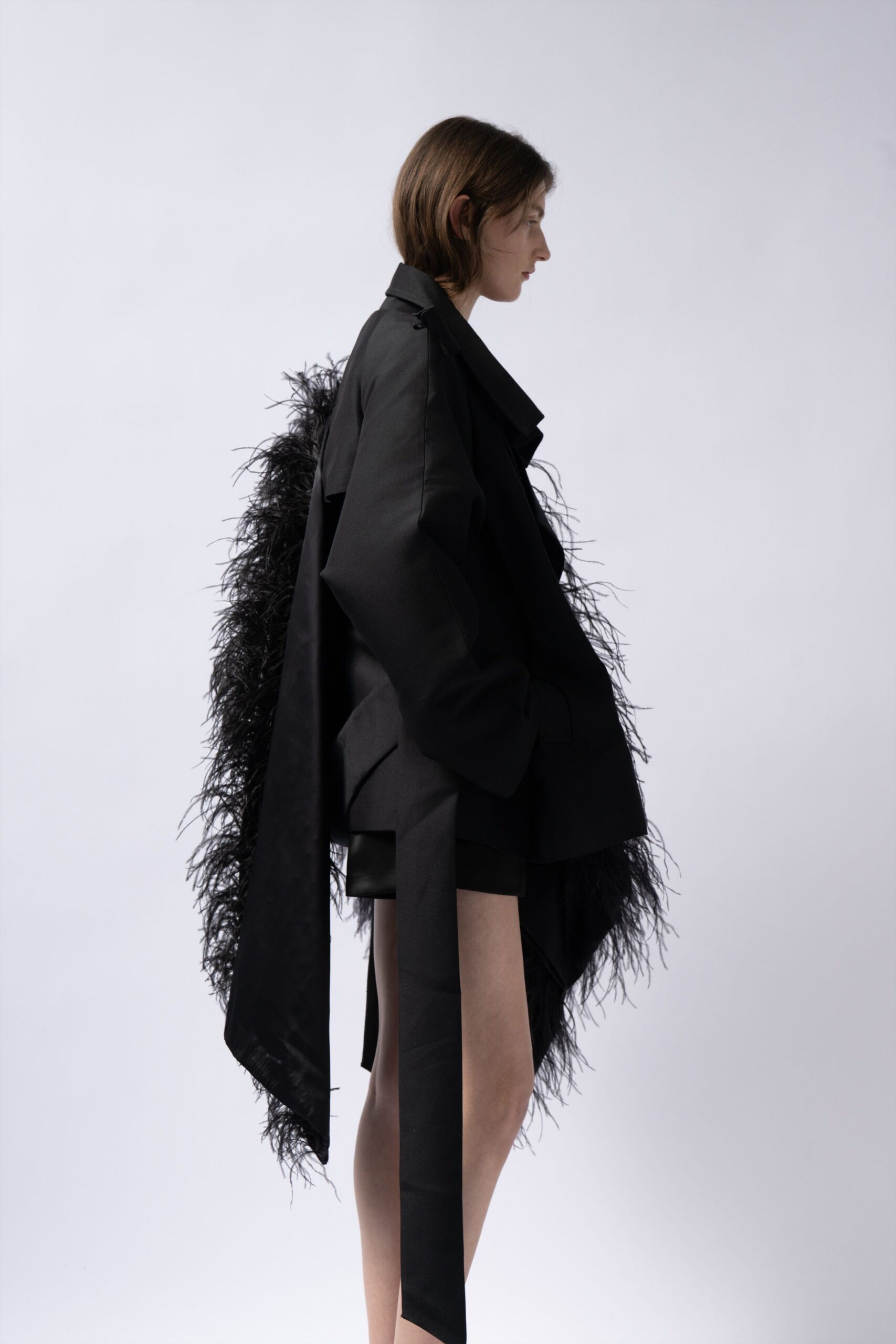 black relaxed jacket with fringed detail
