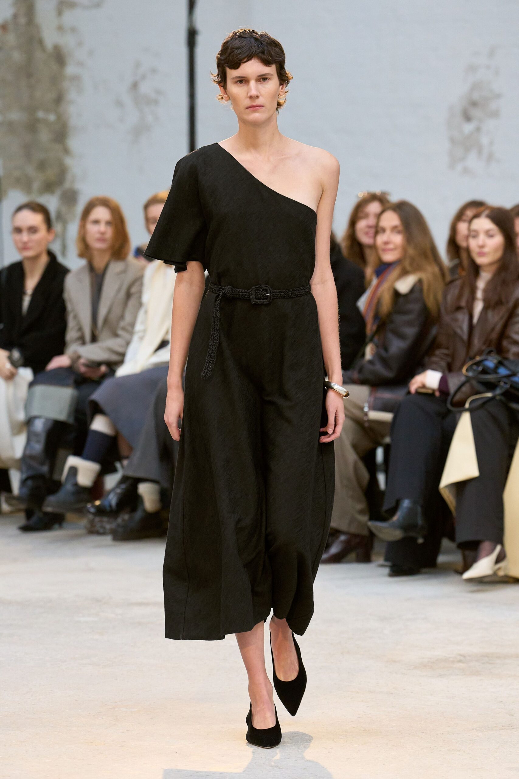 black suede asymmetric dress with heels