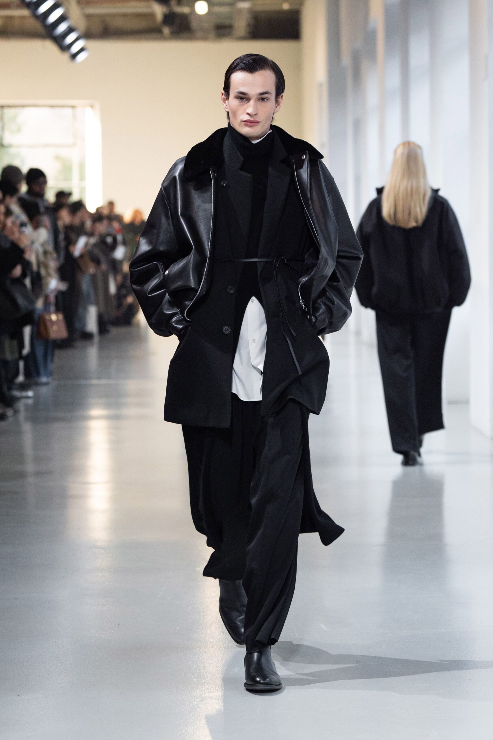 black leather coat with white top