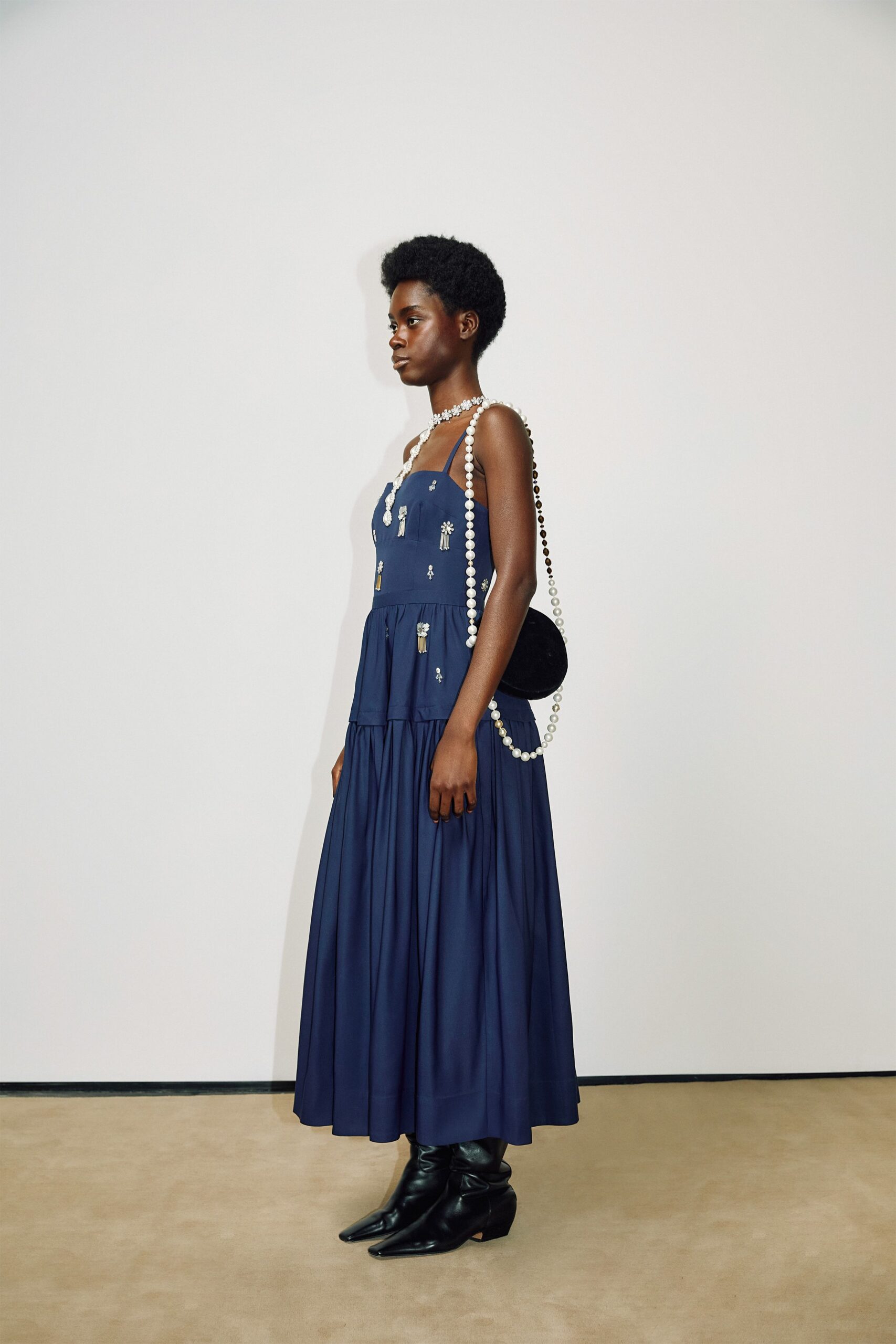 navy pleated maxi dress with boots