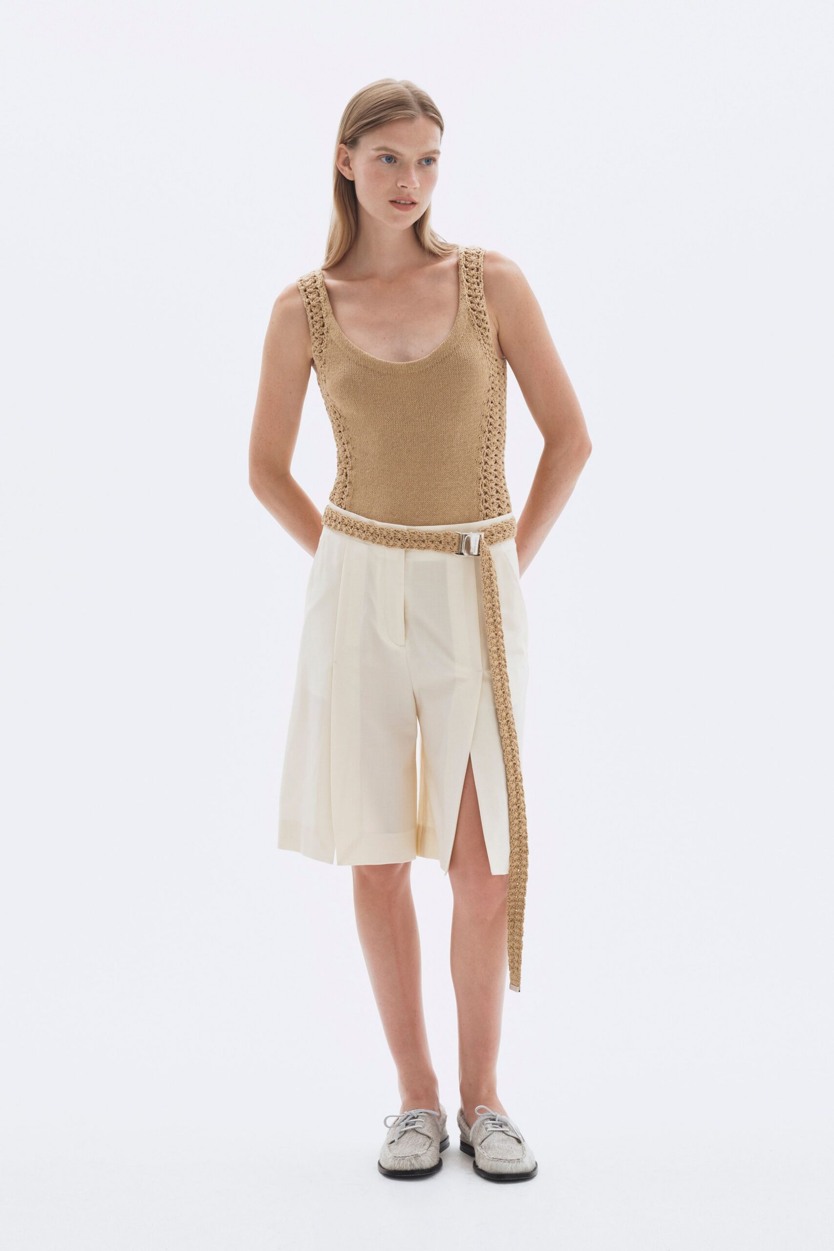 beige bodysuit white shorts