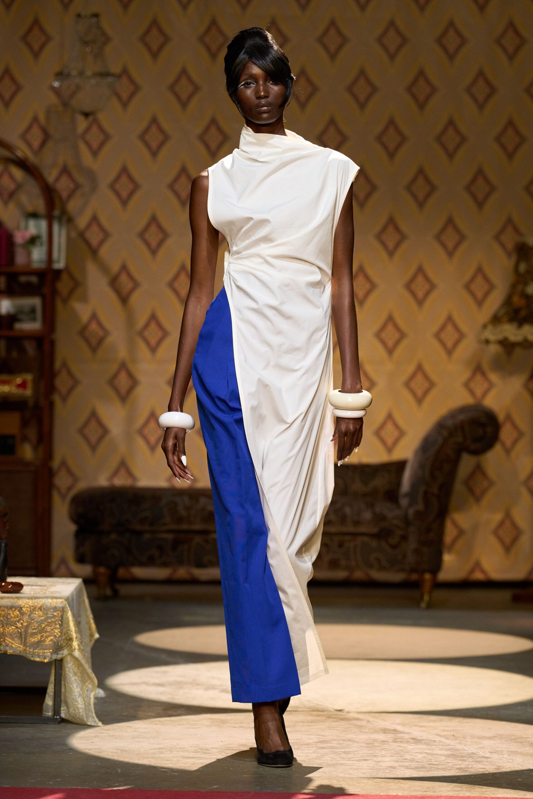 asymmetric white and blue dress with black shoes