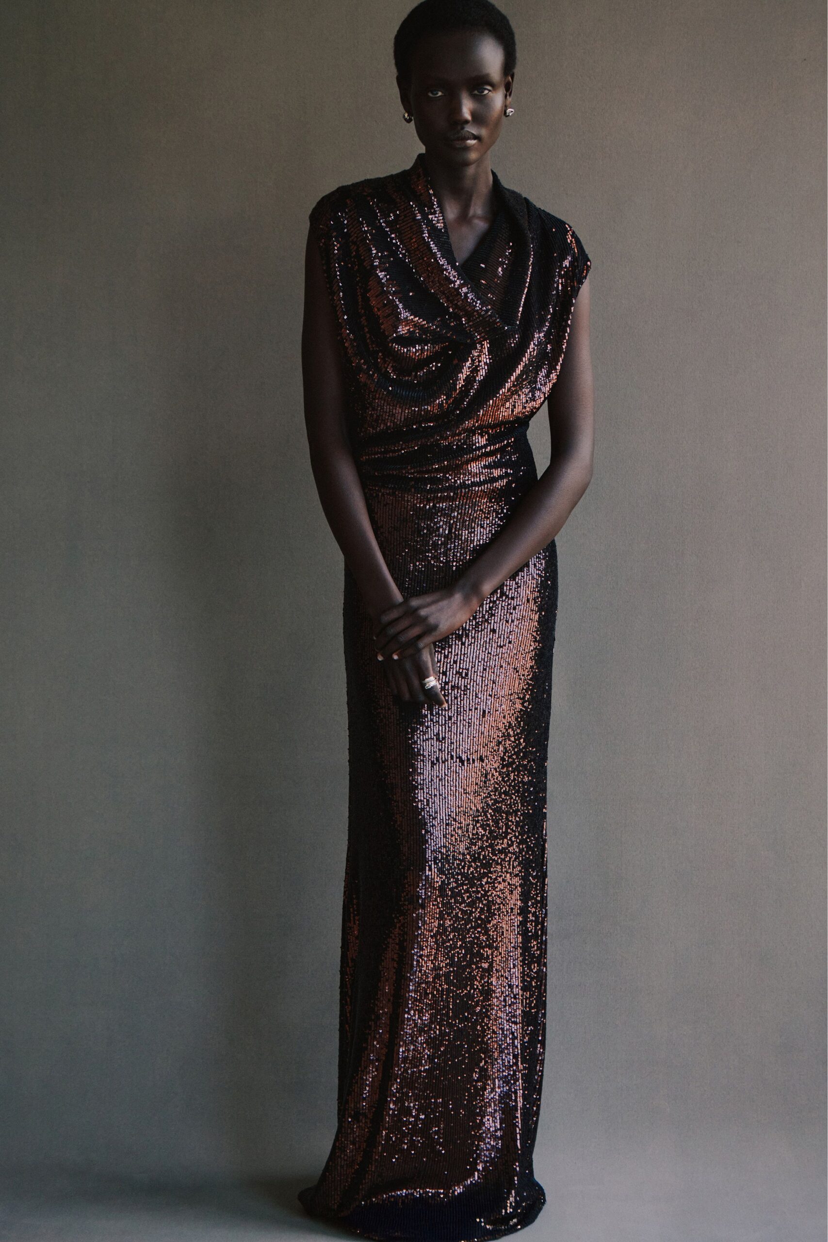 black and gold sequined gown