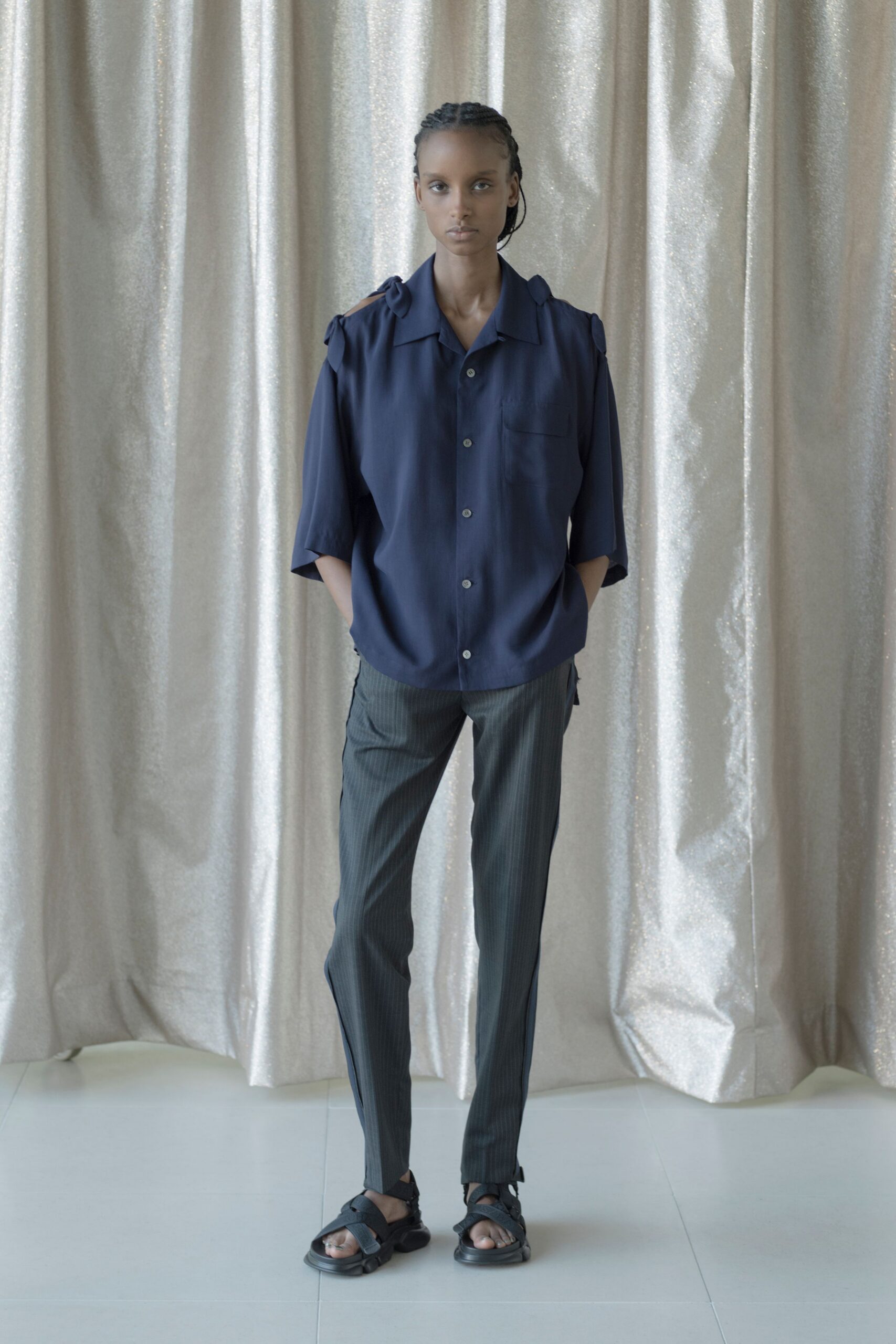 blue relaxed shirt gray tailored pants