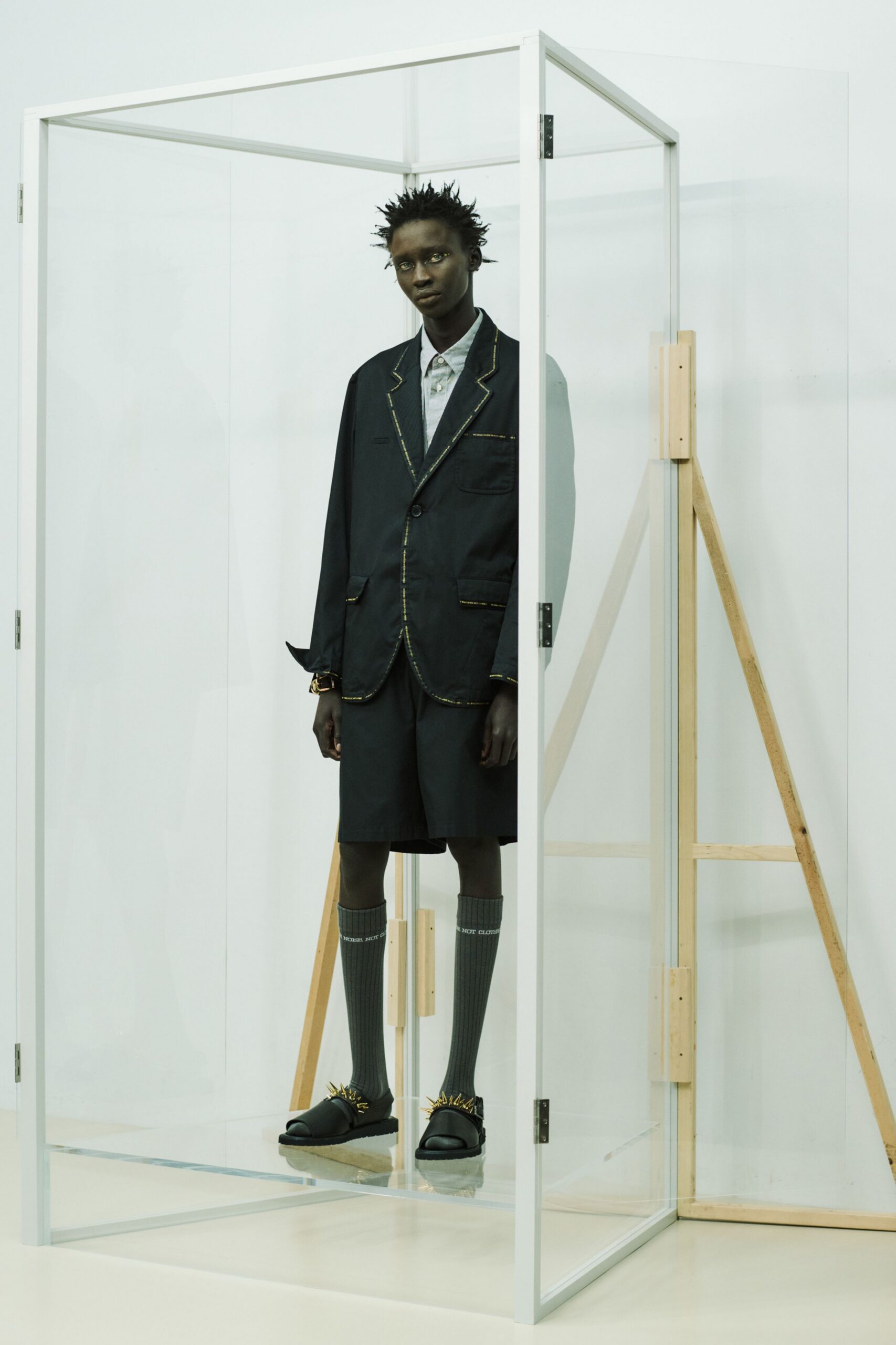 black tailored blazer with shorts
