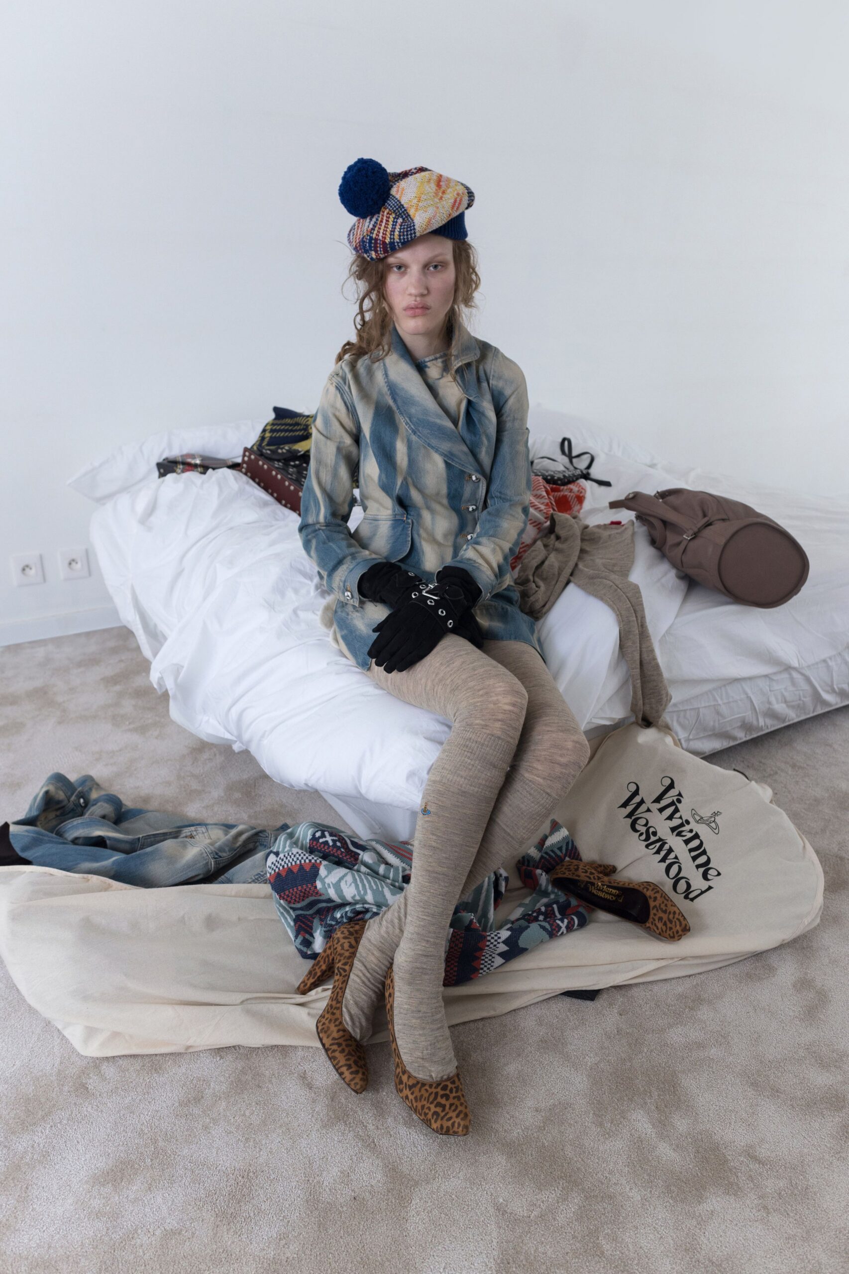 blue striped shirt with beige pants