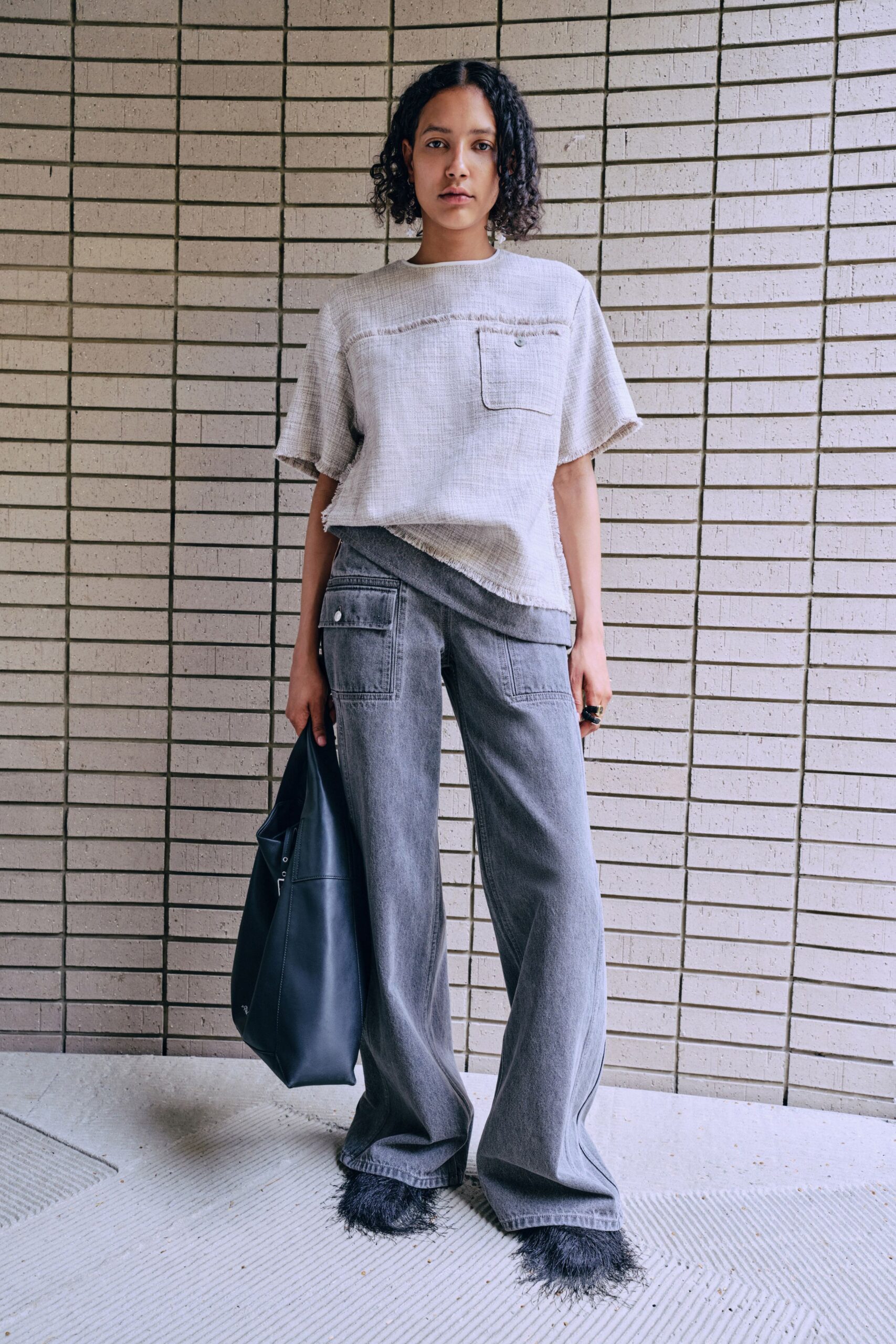 beige relaxed top gray wide-leg pants