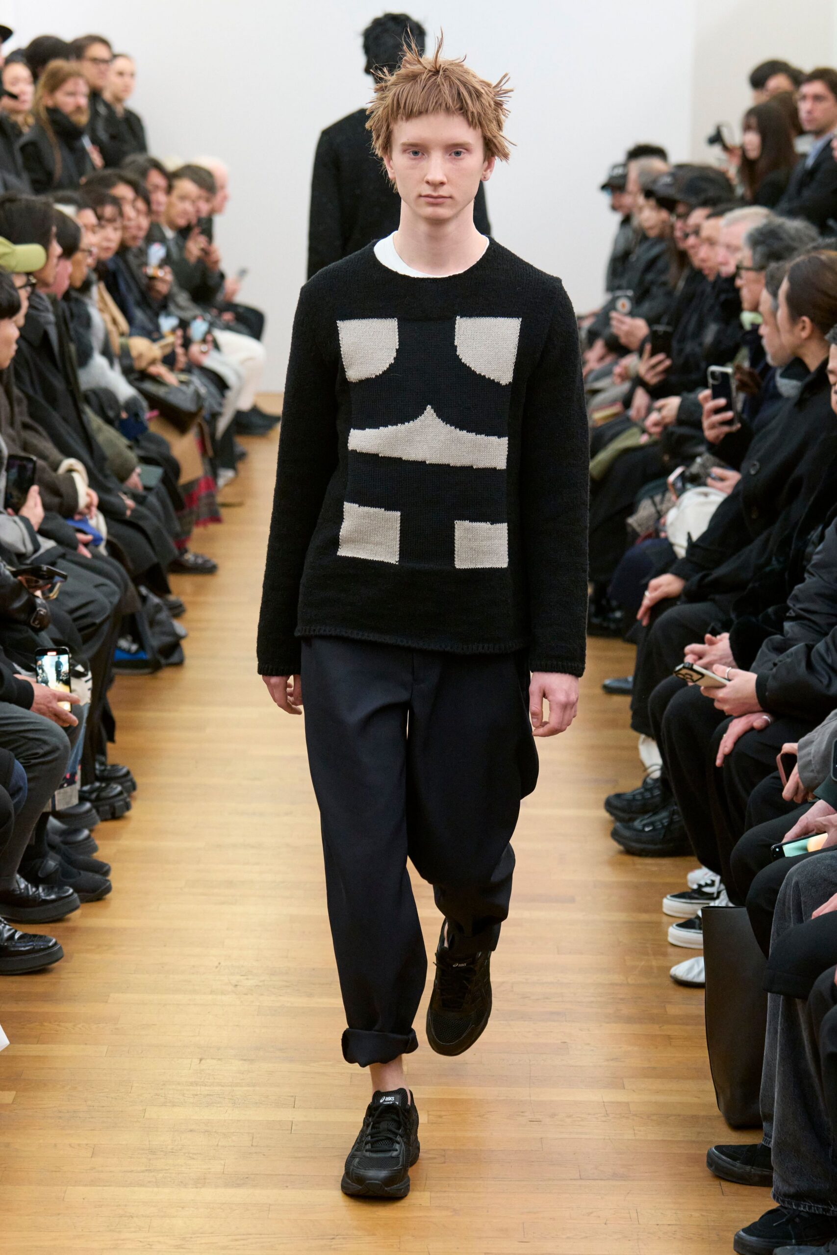 black and gray color-blocked sweater