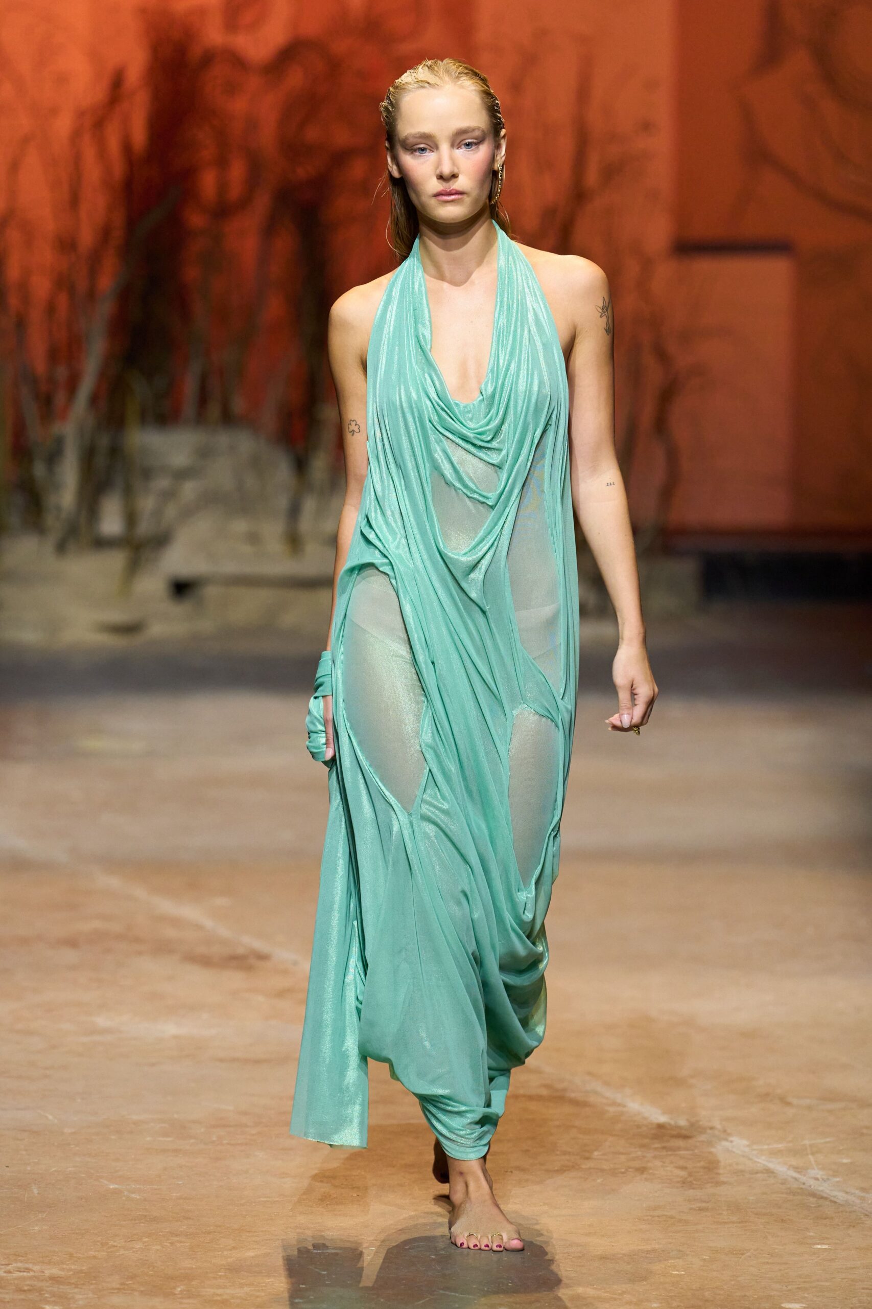 green silk sleeveless draped dress