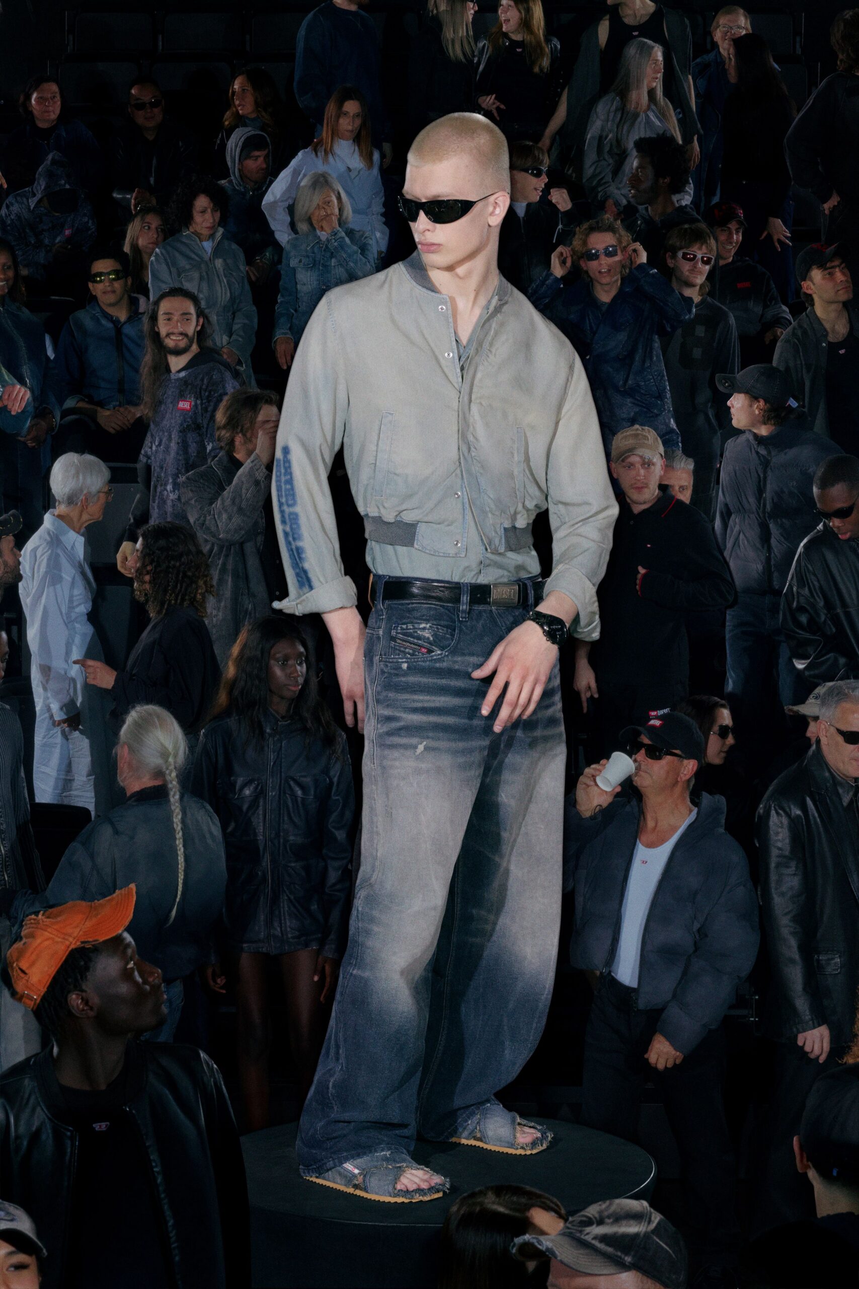 gray relaxed jacket with blue denim pants