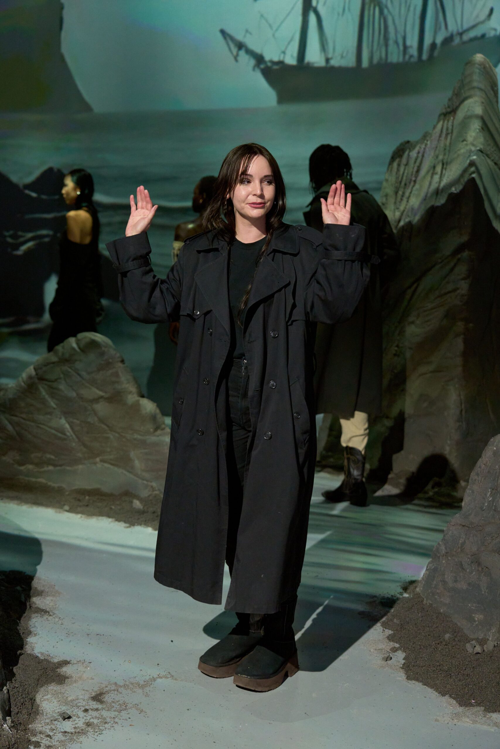 black relaxed coat with fitted pants