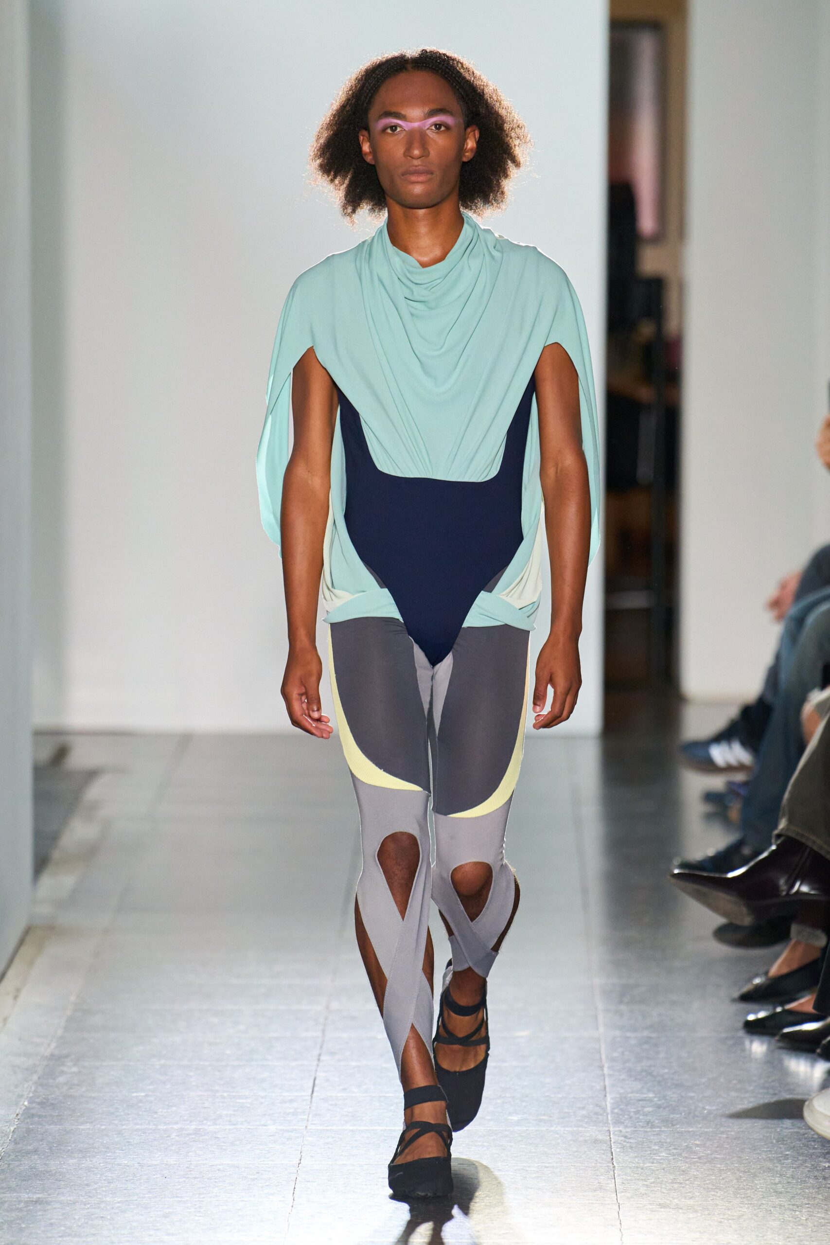 green sleeveless fitted draped top
